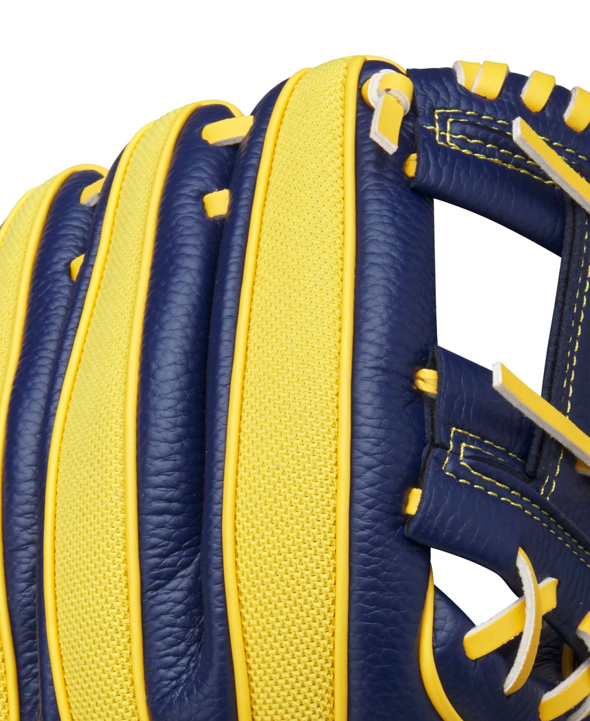 Close-up of the Wilson 2024 A200 EZ Savannah Bananas T-Ball Glove showcasing its yellow and navy blue design and quality stitching.