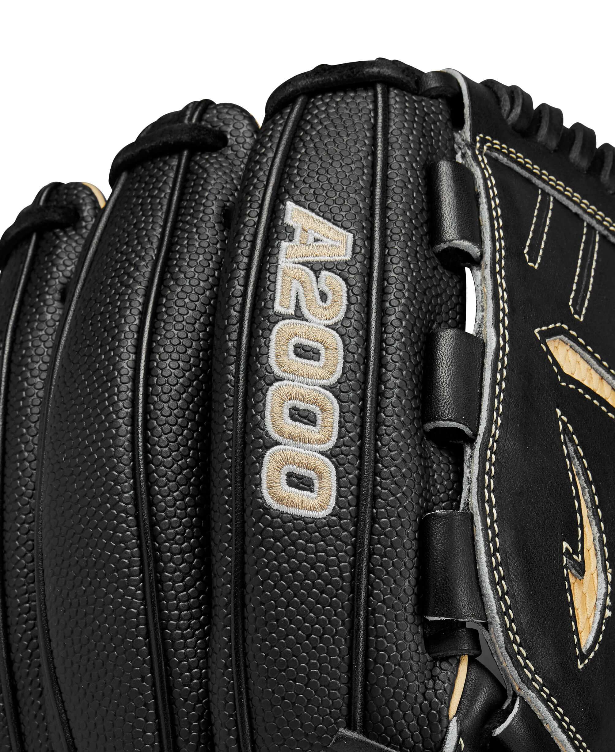 Close-up of Wilson A2000 B23 baseball glove showing detailed leather texture and branding.