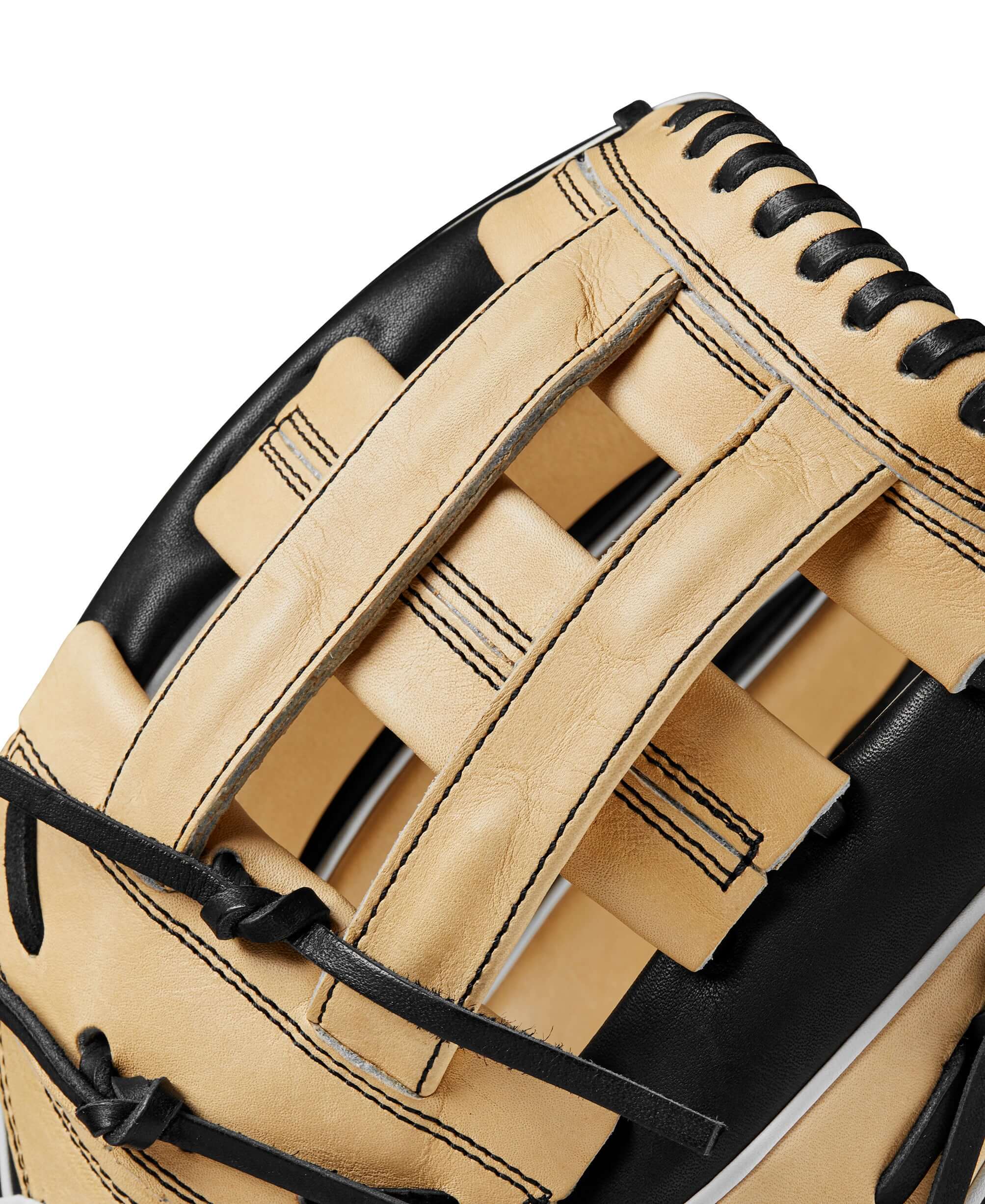 Close-up of Wilson A2000 1750 glove showing Dual Post Web design and leather craftsmanship in black and blonde.