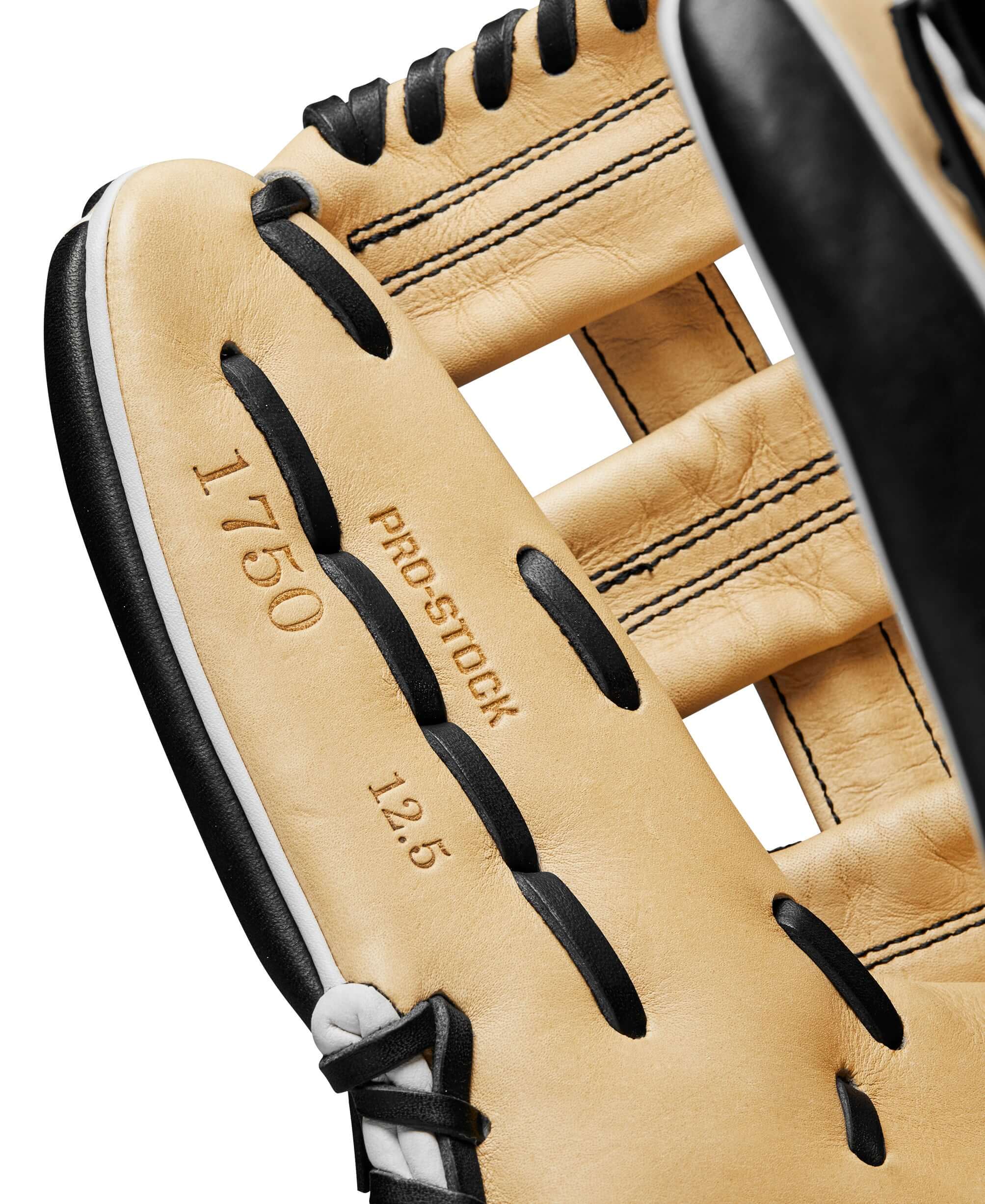 Close-up of Wilson A2000 1750 glove featuring black and blonde leather with 12.5" and PRO-STOCK branding.
