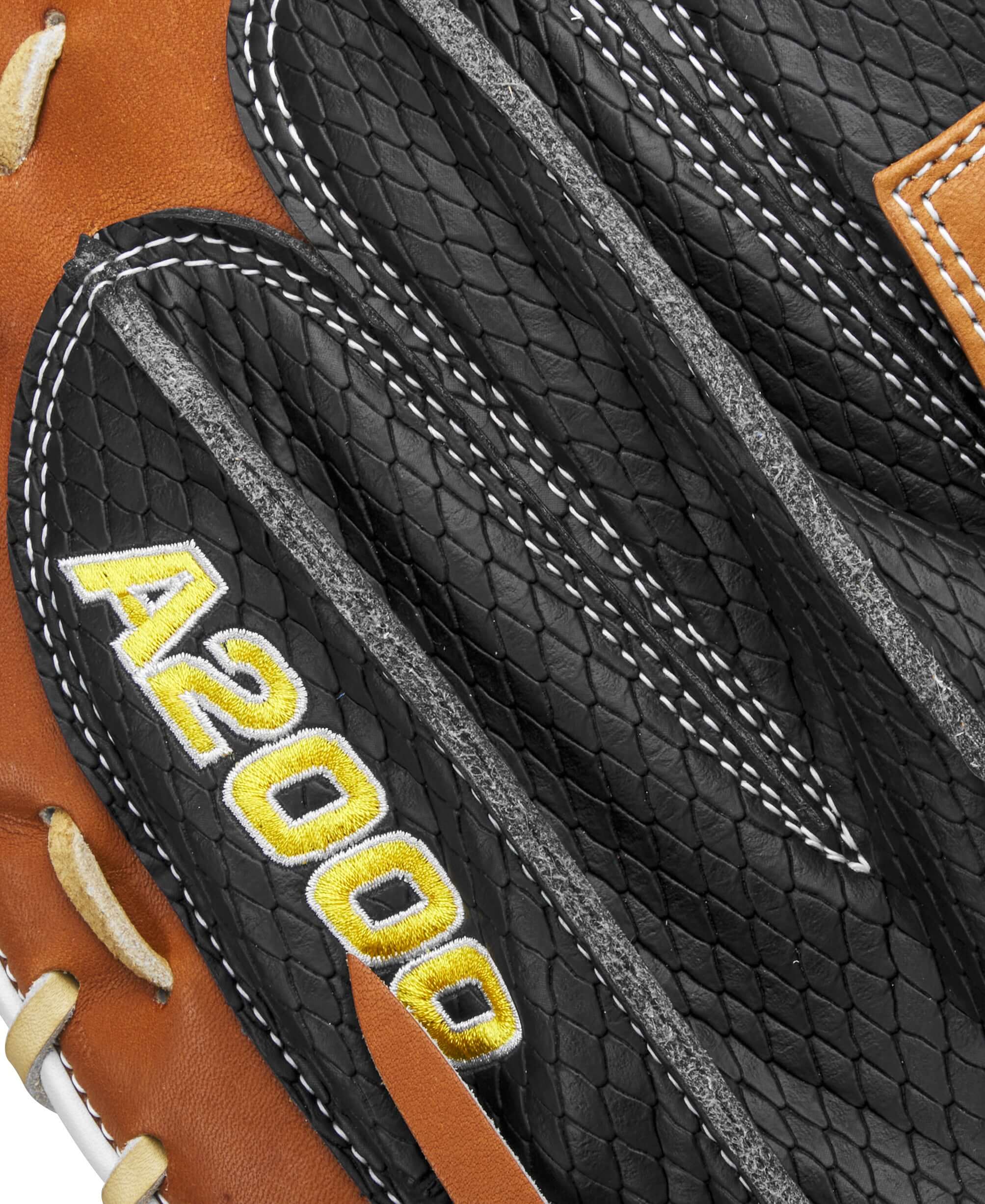 Close-up of Wilson A2000 M23 Catcher's Mitt showcasing the black leather and detailed stitching.
