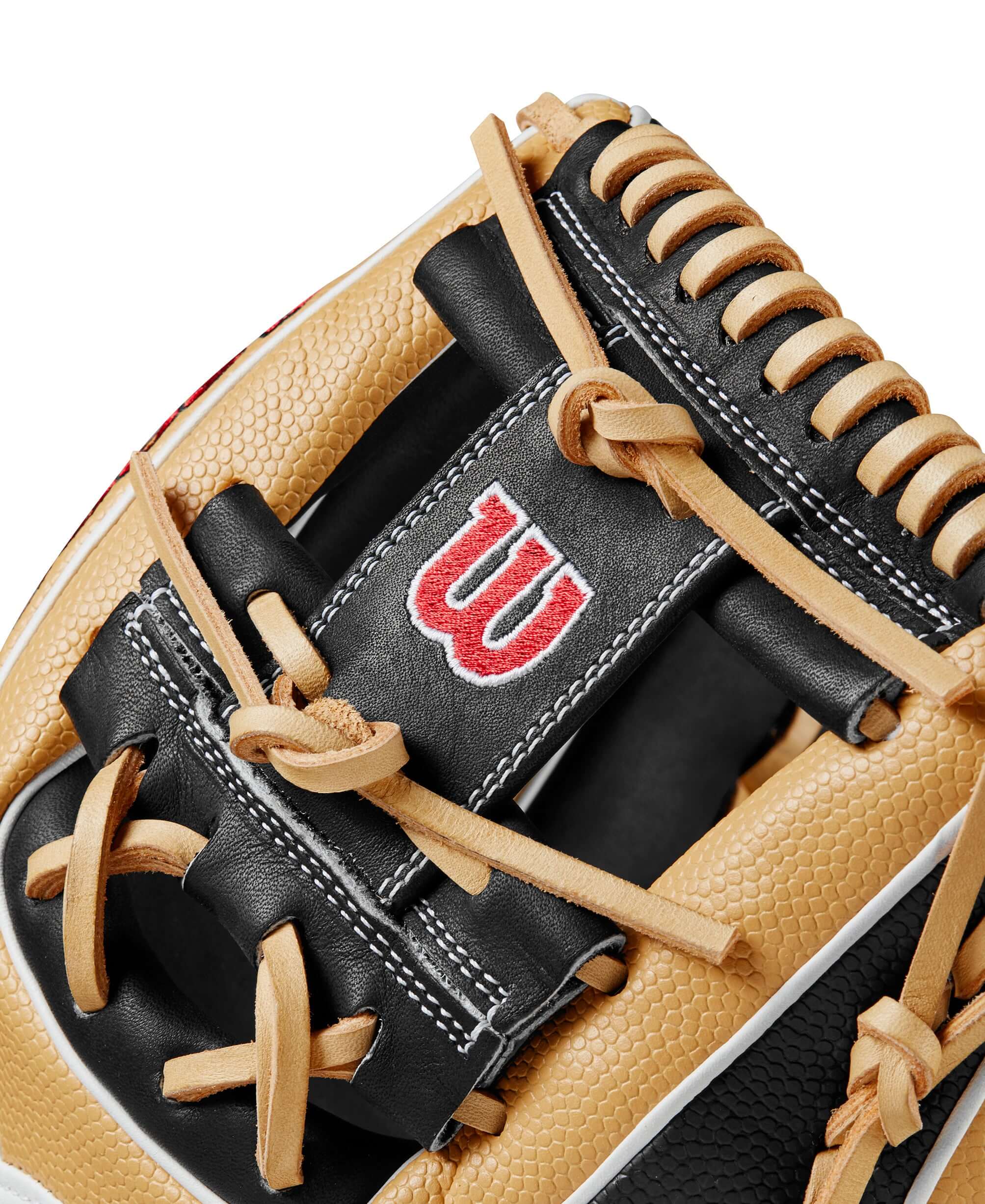 Close-up of Wilson 2024 A2000 DP15SS glove showcasing the blonde and black leather design and logo details.