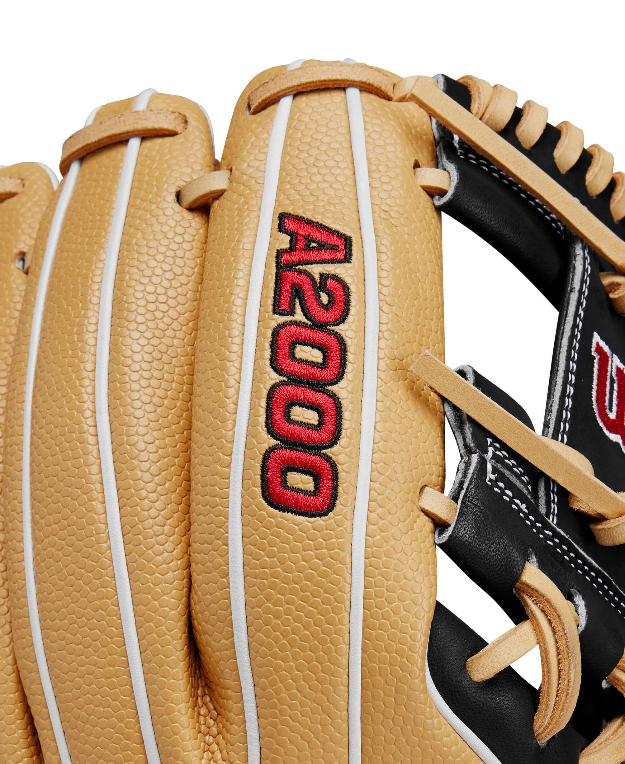 Close-up of the Wilson A2000 DP15SS glove highlighting the logo and premium leather detail in blonde and black colors.
