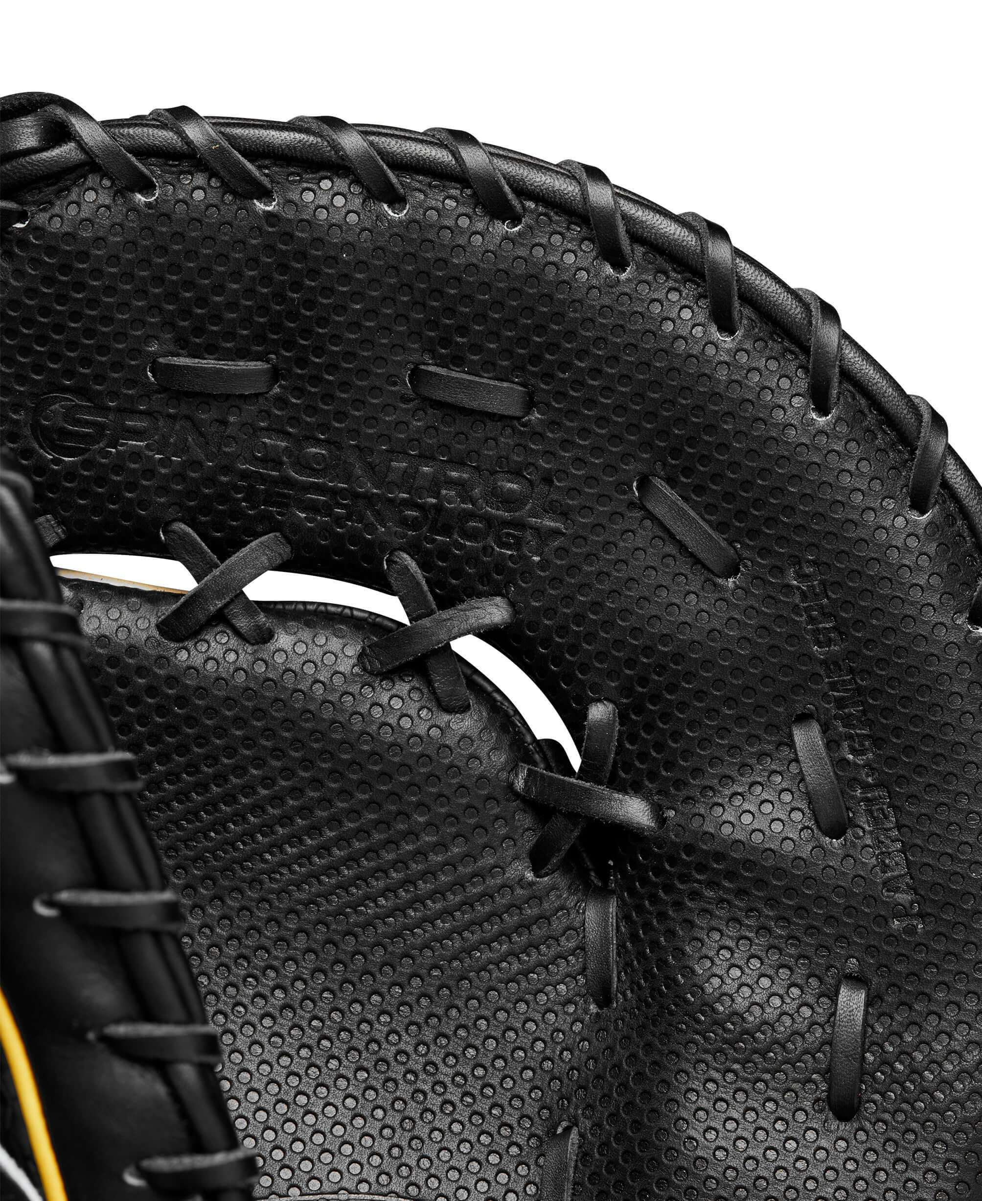 Close-up of the black leather interior of the Wilson A2K José Abreu first base mitt showcasing Spin Control Technology.