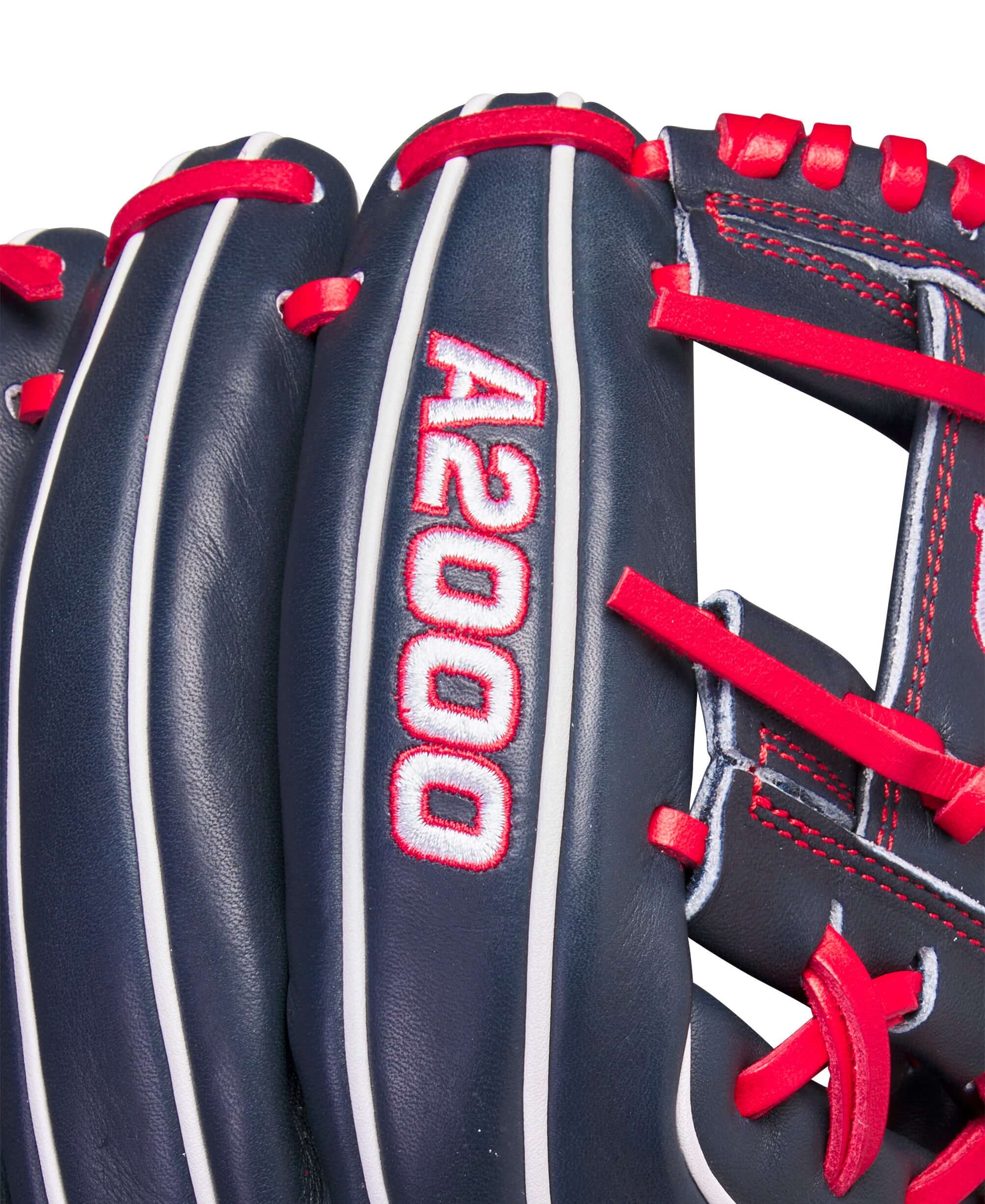 Wilson A2000 July 2023 infield glove showing navy leather, red accents, and 'A2000' logo detail.