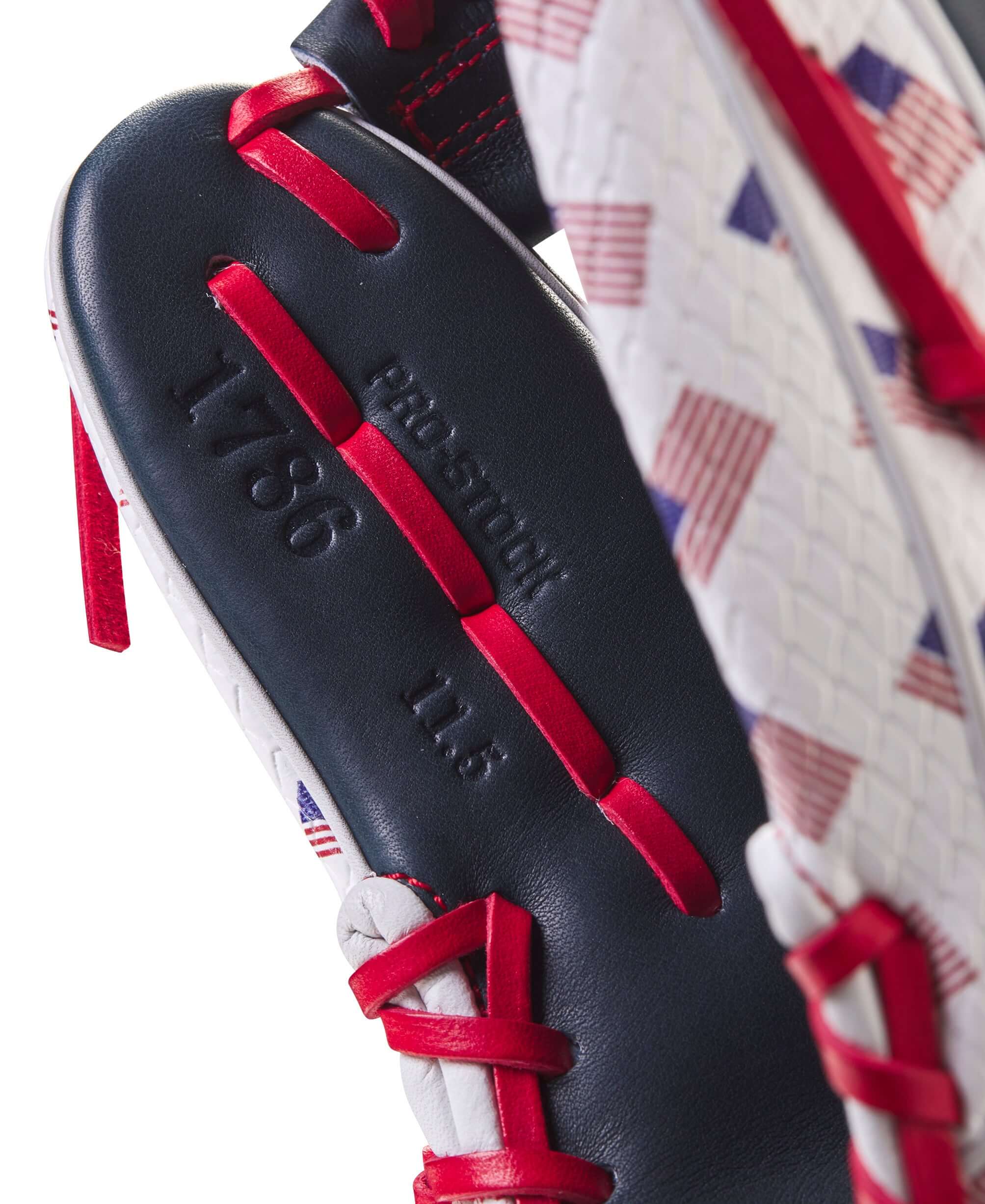 Close-up of Wilson A2000 July 2023 glove detail showing 1786 pattern and Pro Stock Leather design.