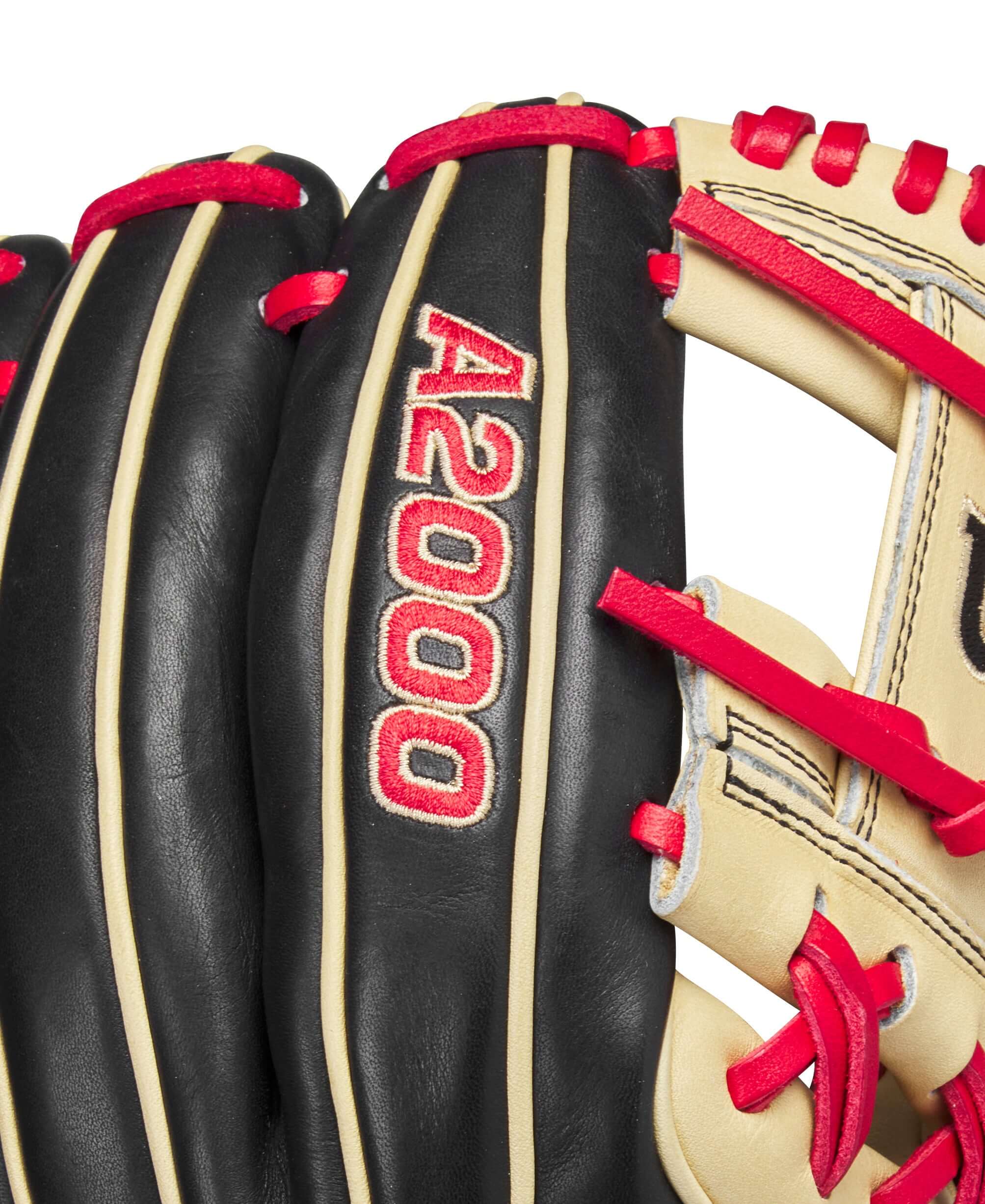 Close-up of Wilson A2000 baseball glove with black and blonde leather, showcasing the A2000 logo.