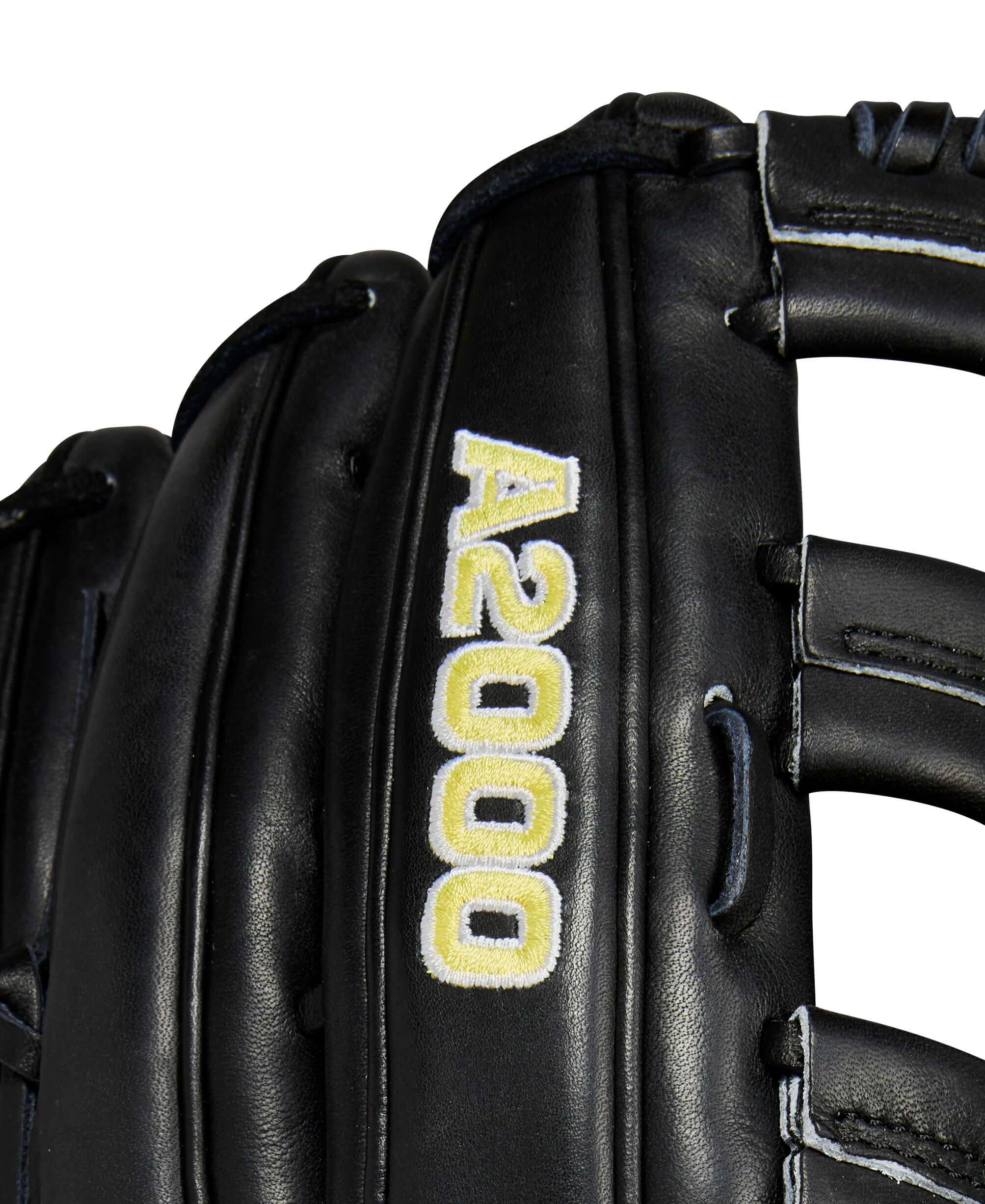 Close-up of Wilson A2000 baseball glove in black leather with yellow stitching and logo.