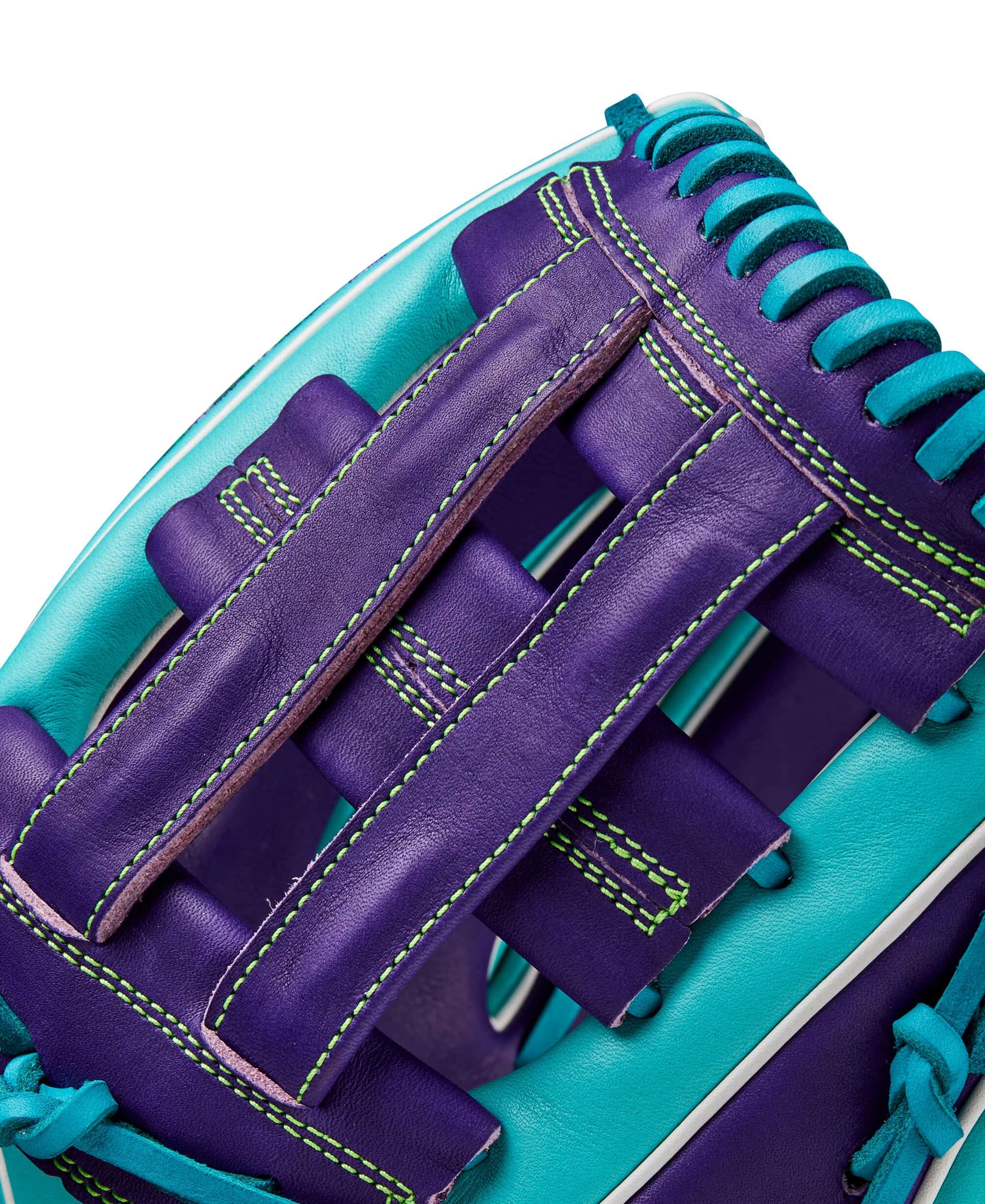 Close-up of the Wilson A2000 DW5 glove's teal and purple leather with detailed stitching and dual post web design.