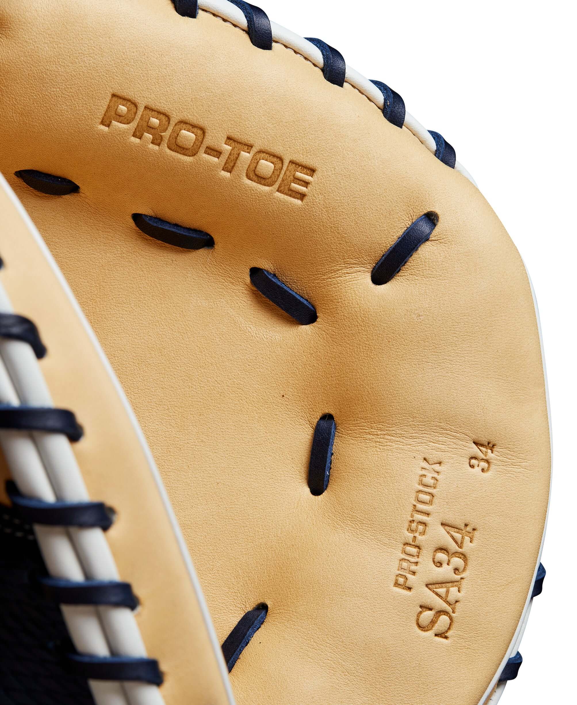 Inside view of Wilson A2000 SA34SS catcher’s mitt showing 'PRO-TOE' and 'PRO-STOCK' embossed lettering.