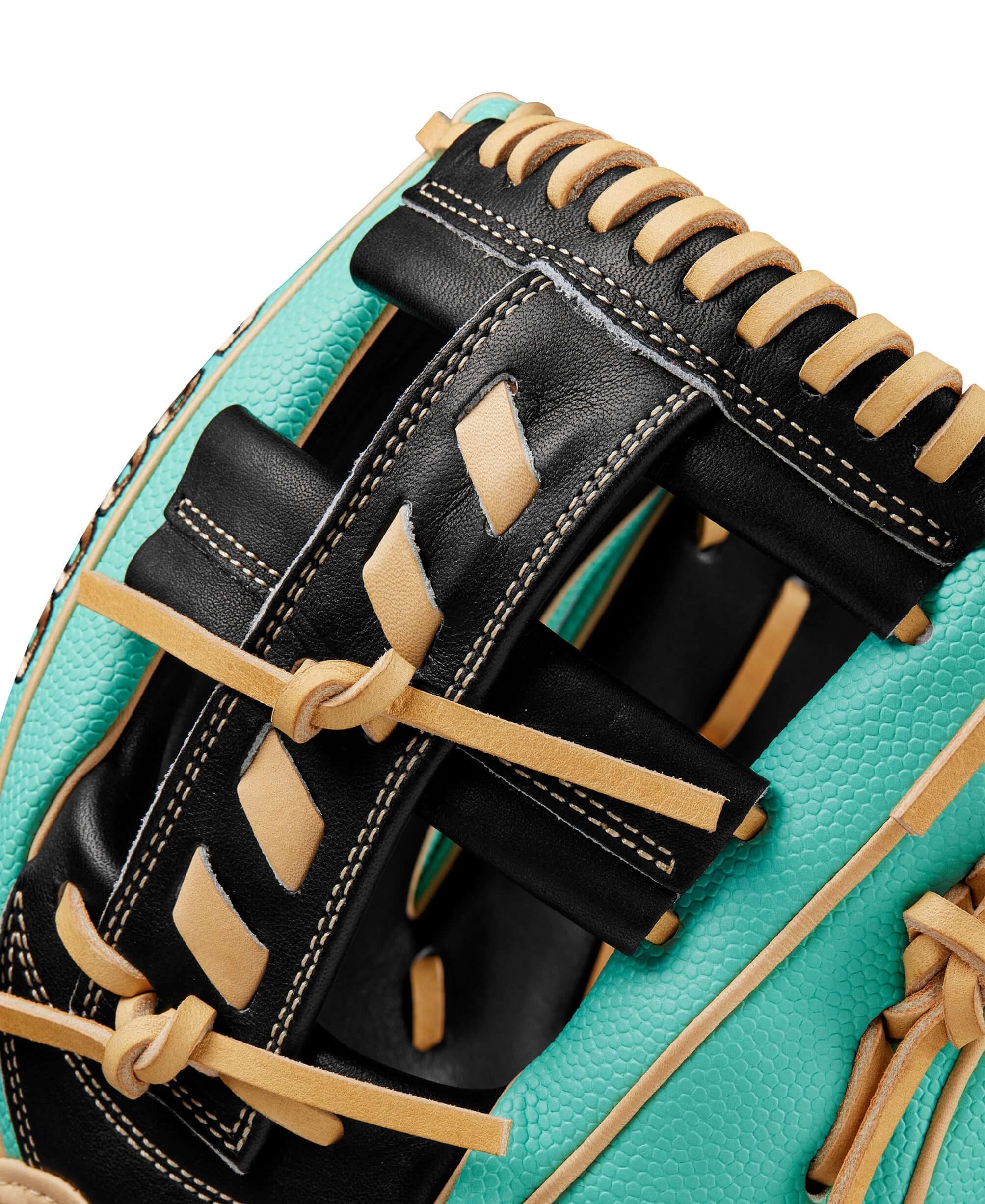 Close-up of Wilson A2000 1716SS glove showing Seafoam SuperSkin and black leather features.