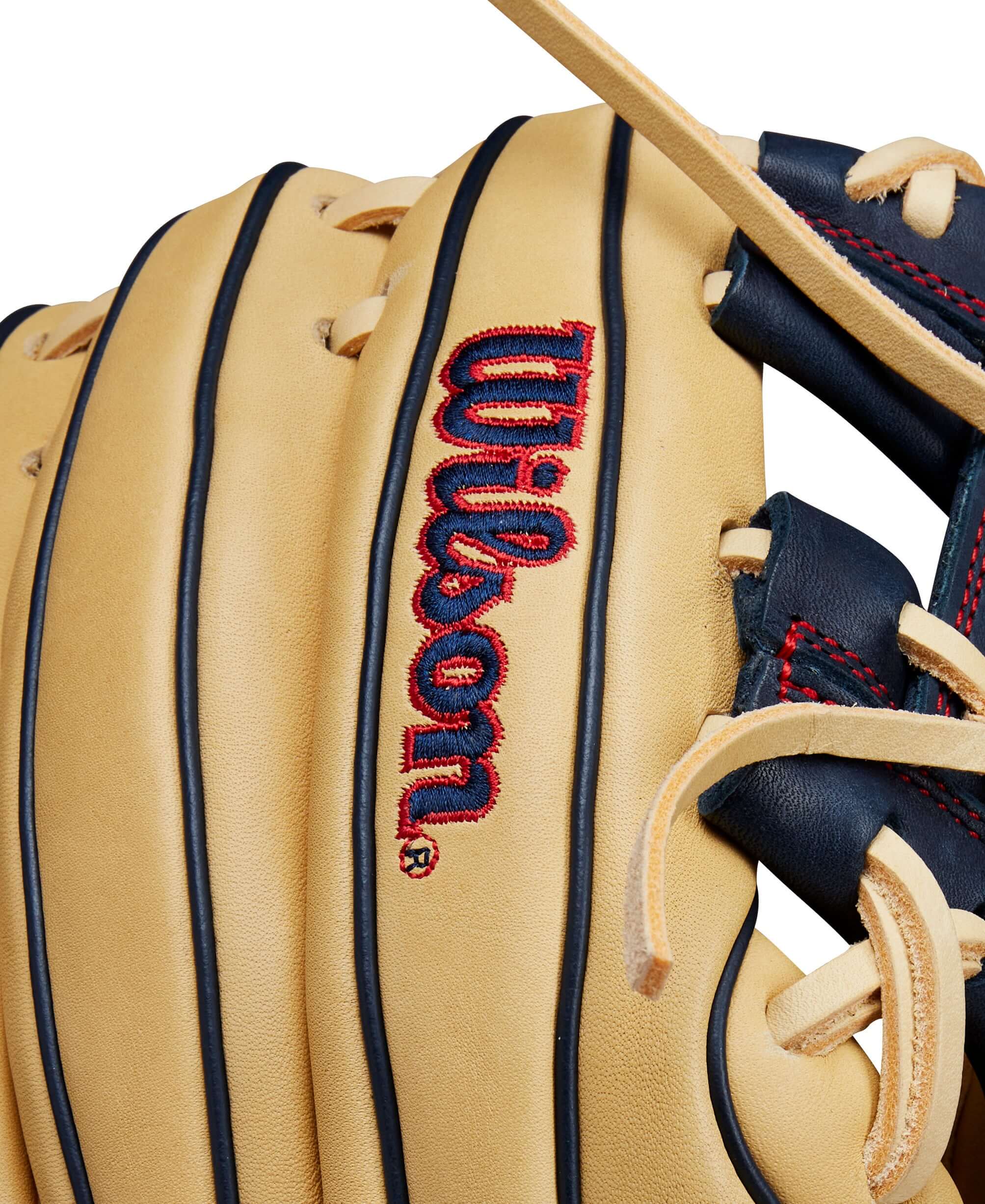 Wilson A1000 PF11 glove in blonde and navy with red stitching, showcasing quality full-grain leather and H-Web design.
