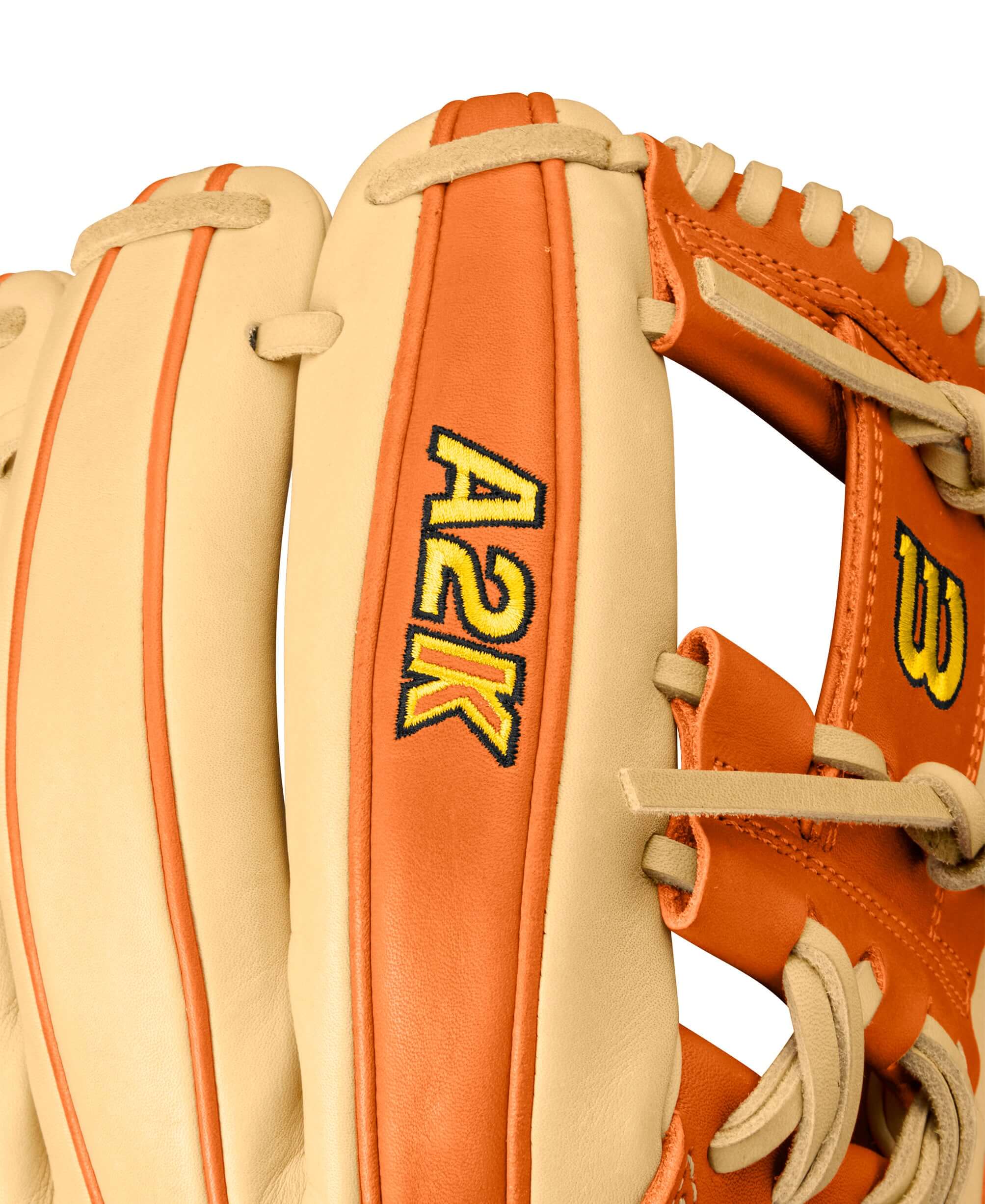 Close-up of Wilson A2K Matt Chapman glove, featuring orange tan and blonde leather with A2K logo and stitching details.