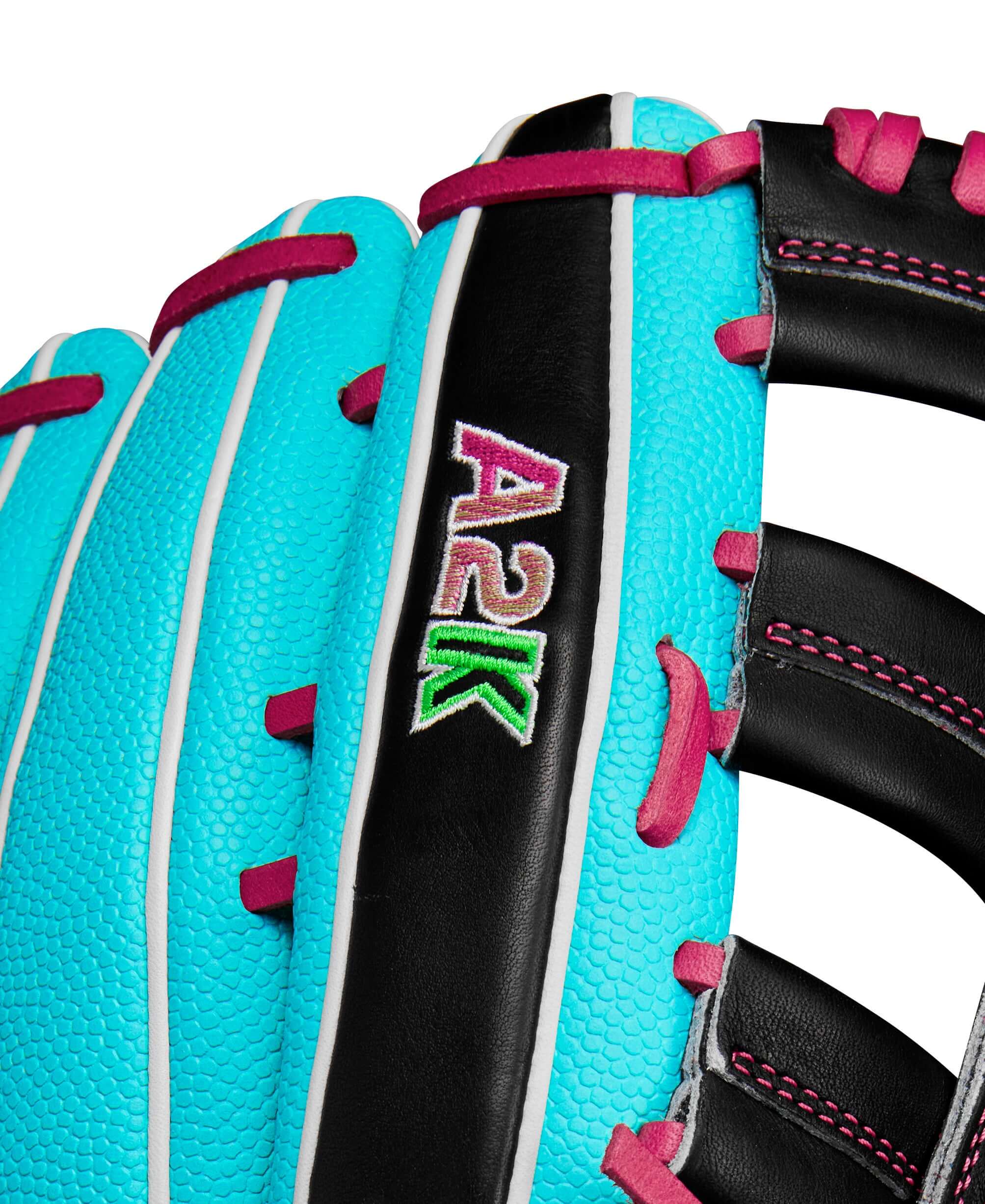 Close-up of Wilson A2K glove showcasing teal SuperSkin™ and pink accents, highlighting the design and craftsmanship.