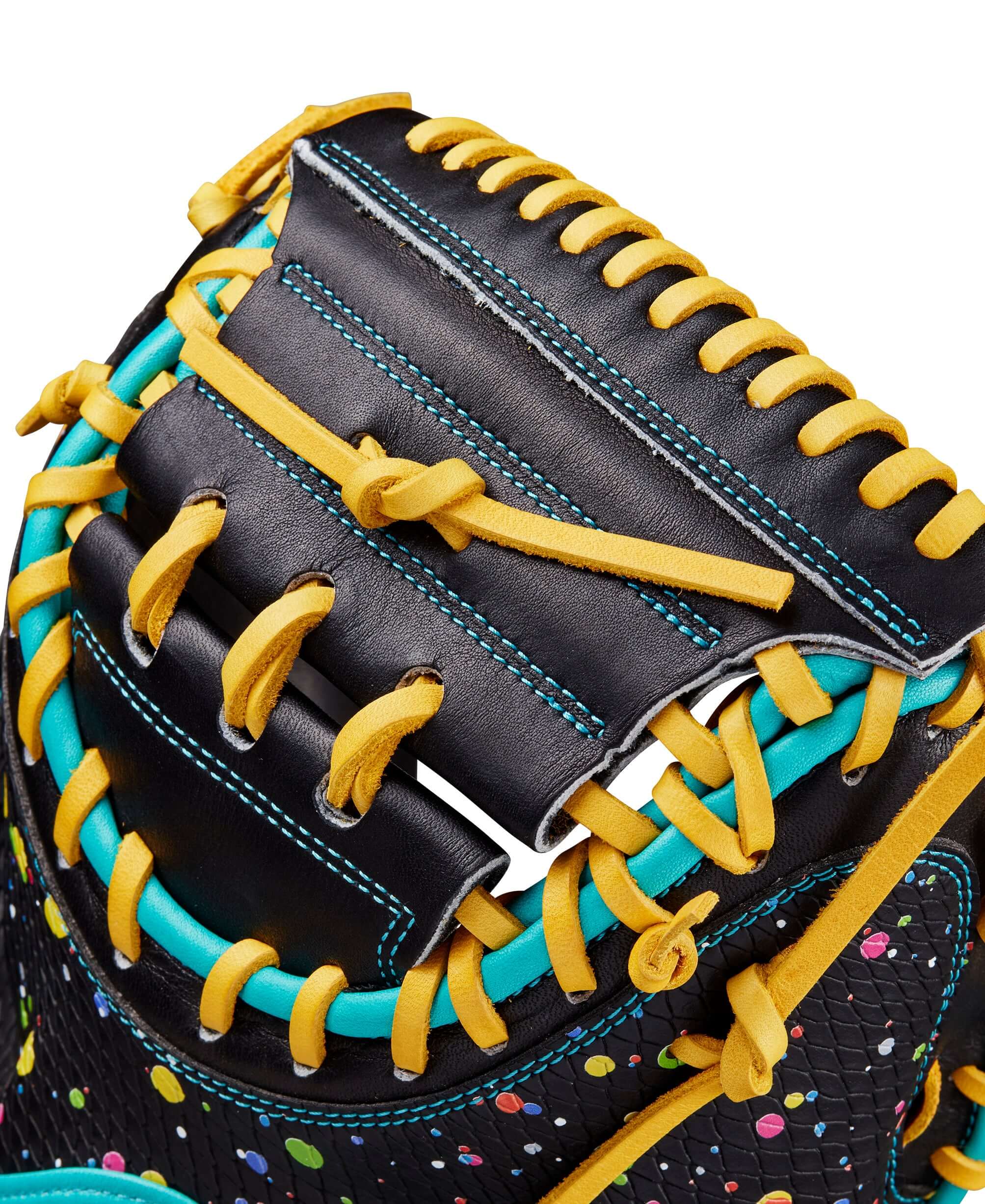 Close-up of Wilson A2000 PF33SS catcher's mitt showing vibrant color detailing and high-quality leather construction.