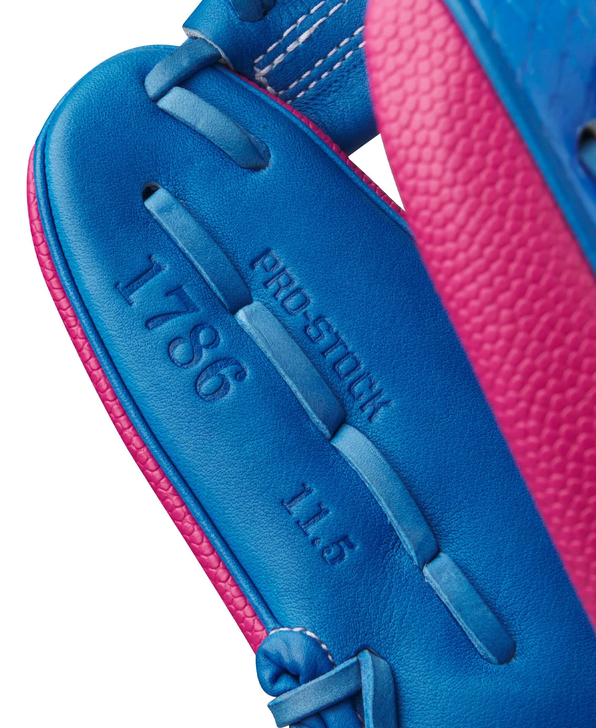 Close-up of Wilson A2000 1786SS glove showing Pro Stock label, 11.5 inches, in Autism Speaks colors.