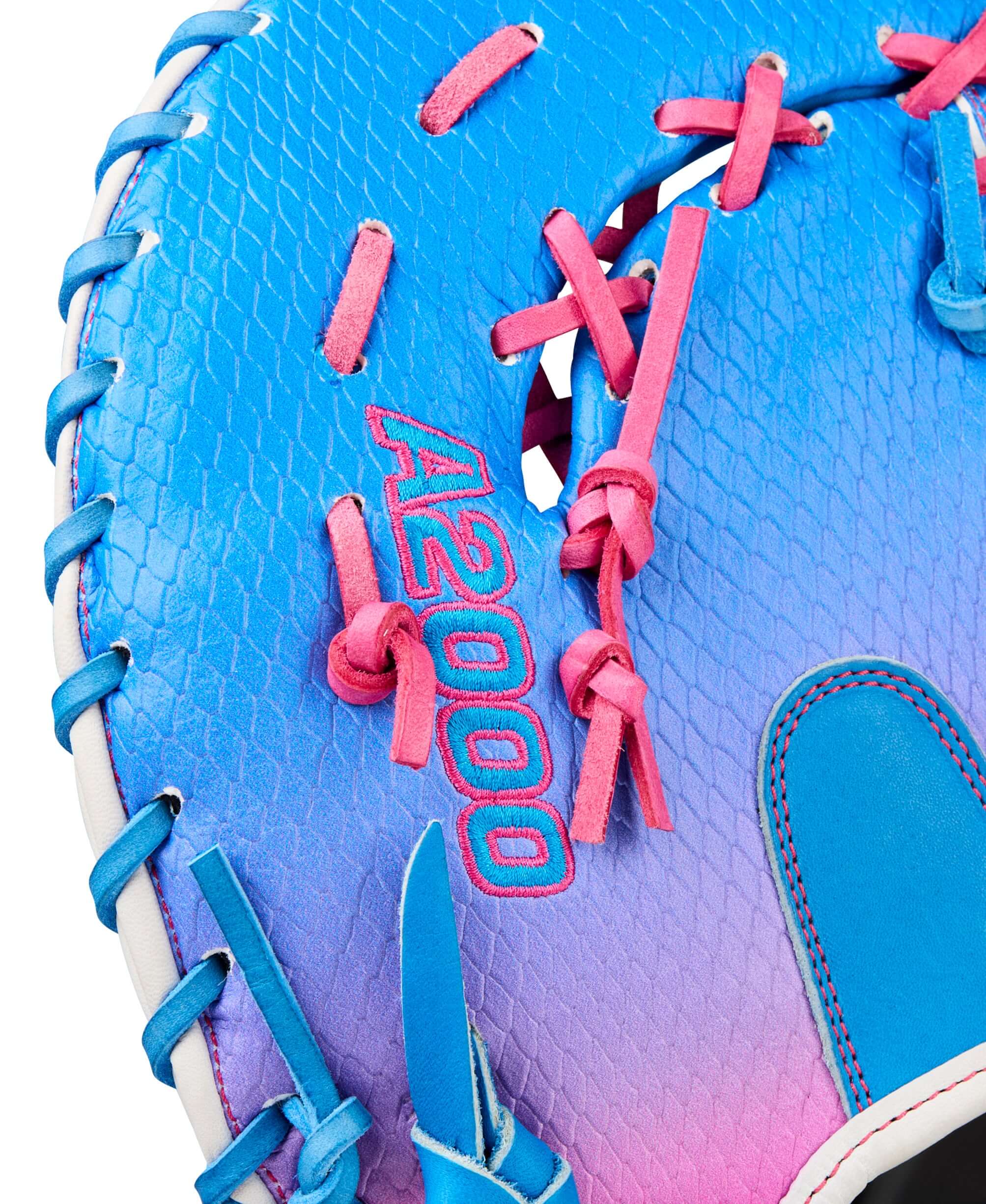 Close-up of Wilson A2000 1612SS baseball glove showcasing vibrant blue and pink design.