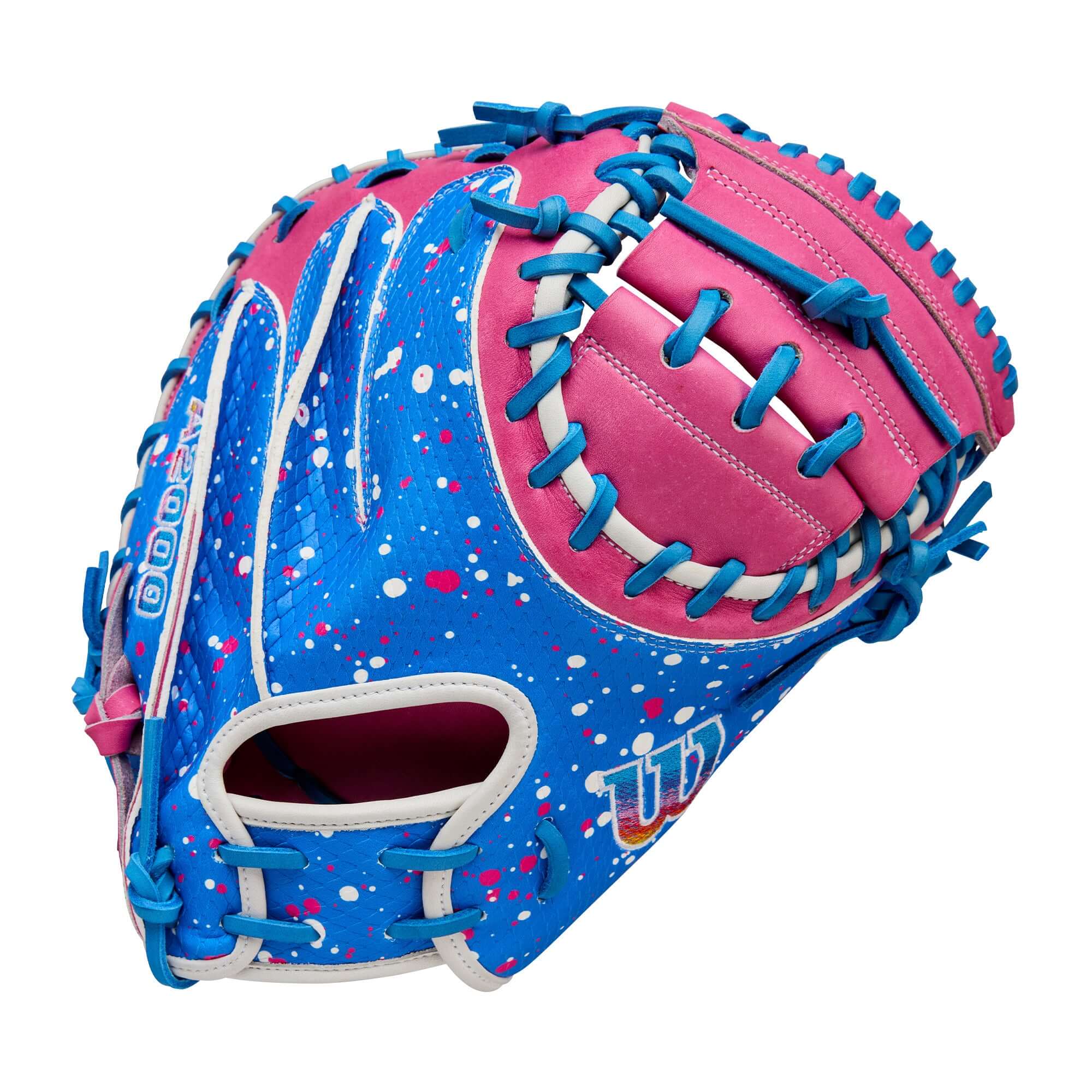 Wilson 2025 A2000 CM33SS catcher’s mitt in blue and pink with splatter paint design.