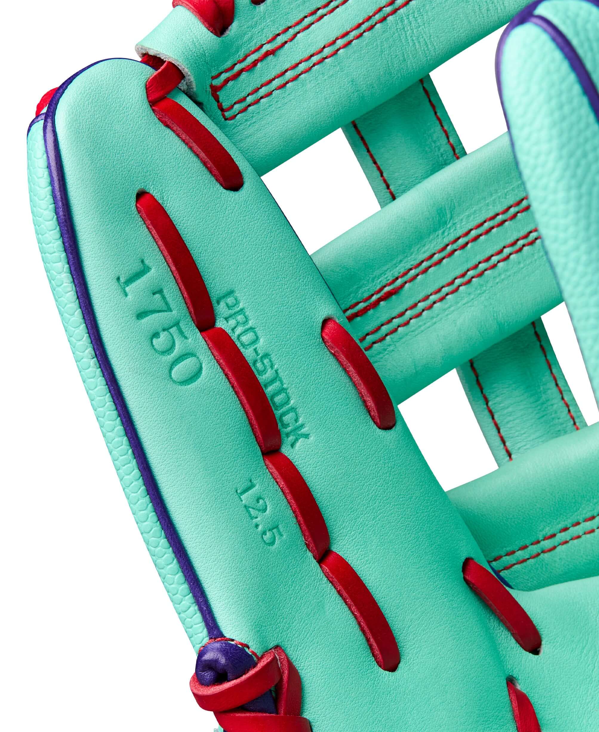 Wilson A2000 1750SS 12.5” Outfield Glove LHT thumb front detail highlighting laces and stitching.