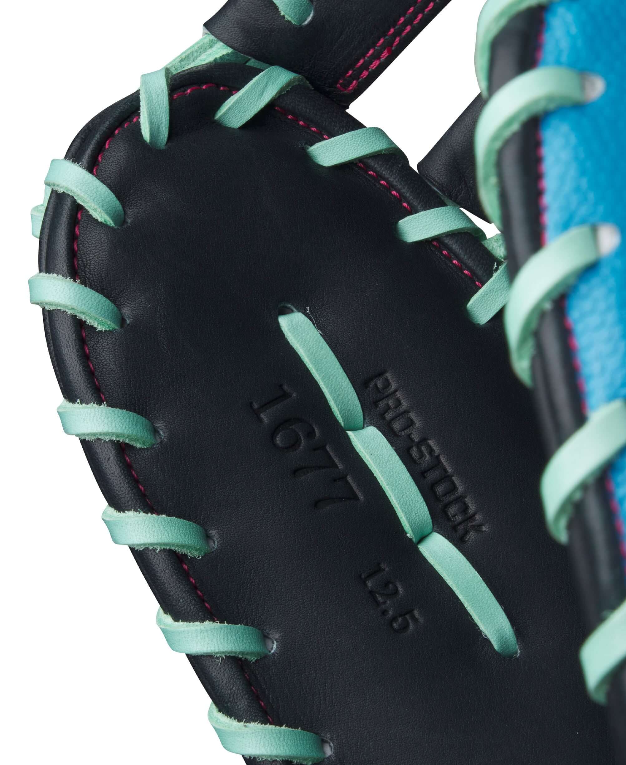 Wilson 2025 A2000 1677SS 12.5” First Base Mitt LHT front thumb detail with stitching and leather grain.