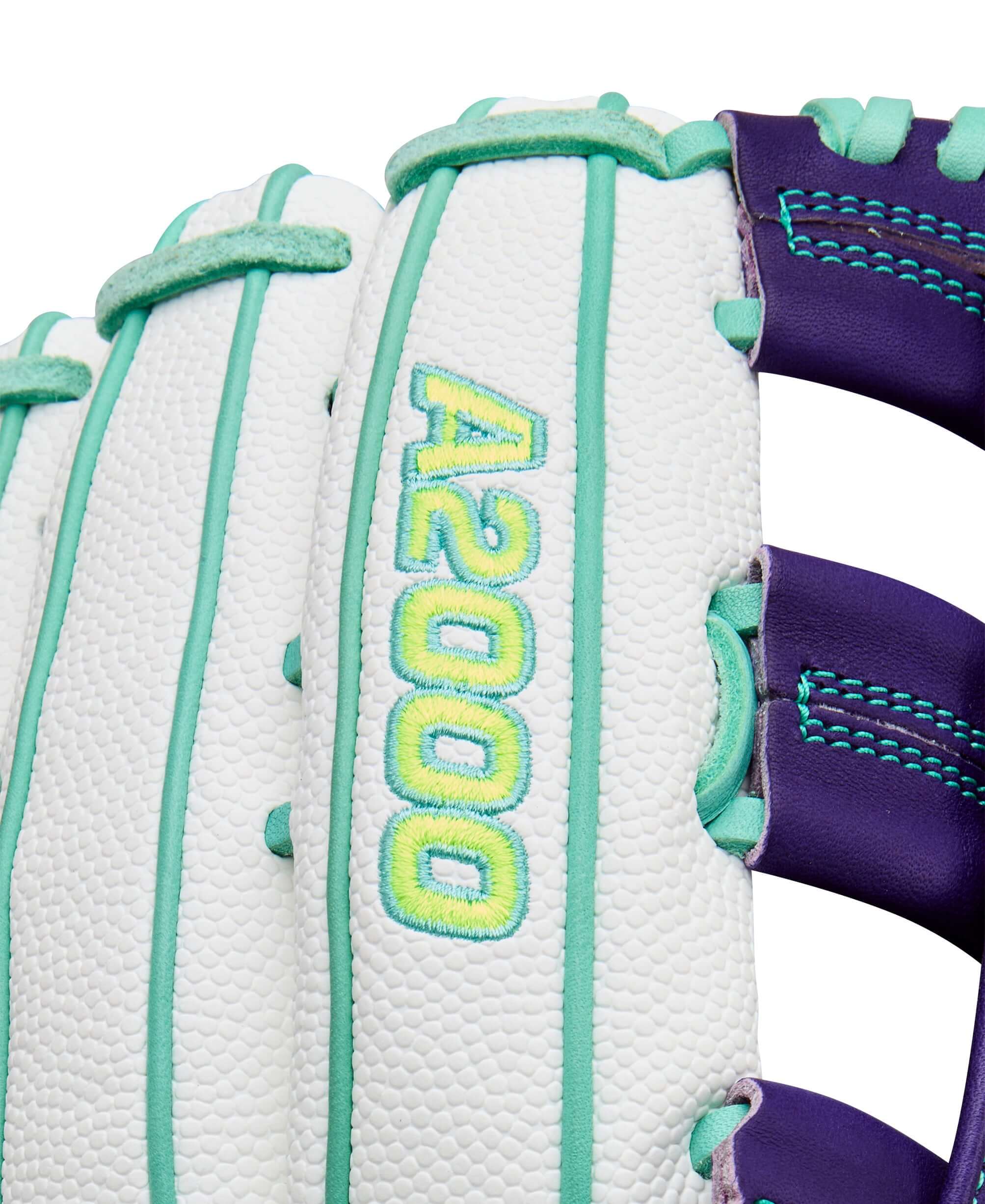 Wilson 2025 A2000 FP50SS 12.25” Fastpitch Outfield Glove LHT close-up A2000 logo in Purple/White.