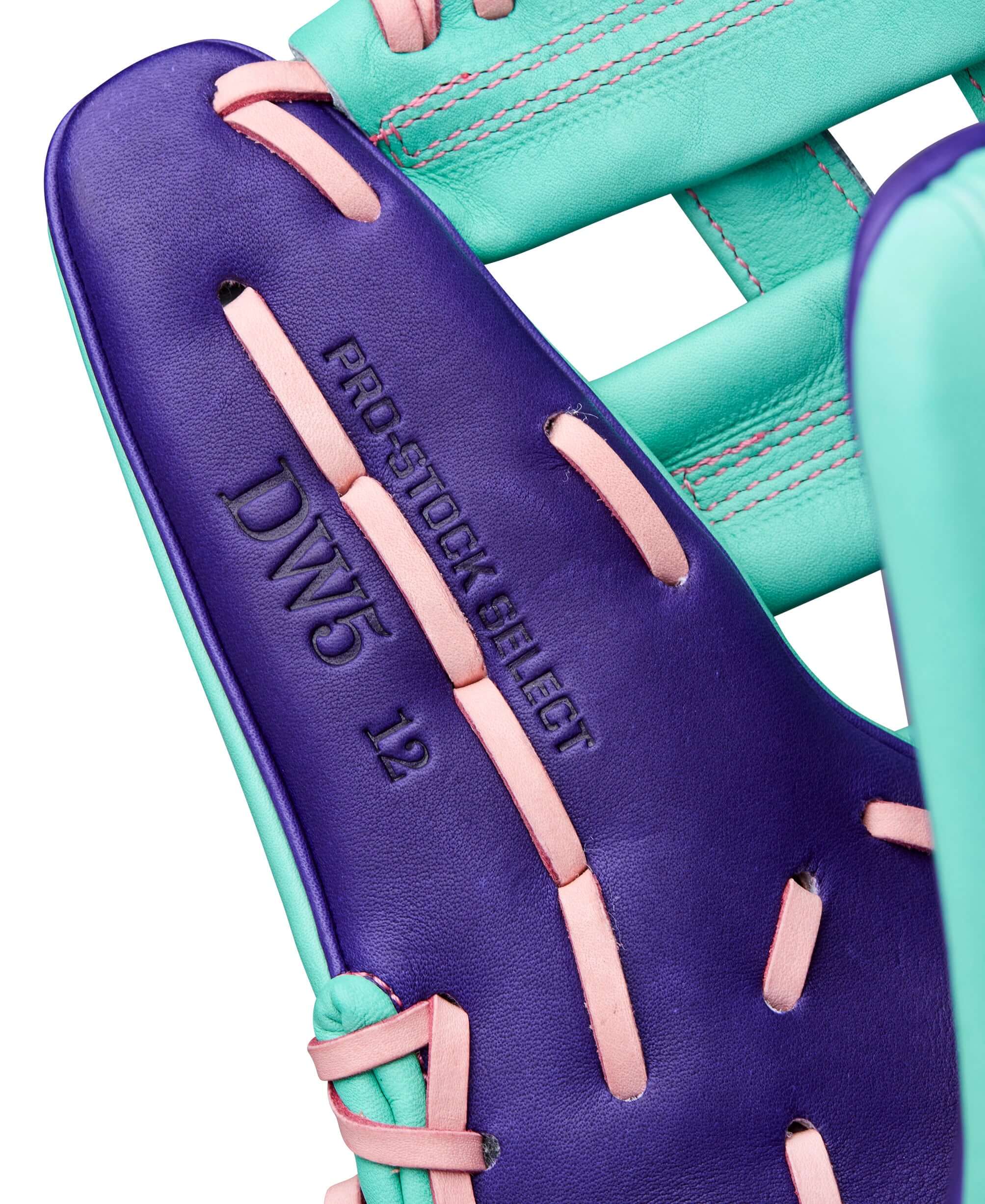 Thumb detail of Wilson Winter 2025 A2K DW5 12” Infield Baseball Glove highlighting smooth Purple leather and stitching.