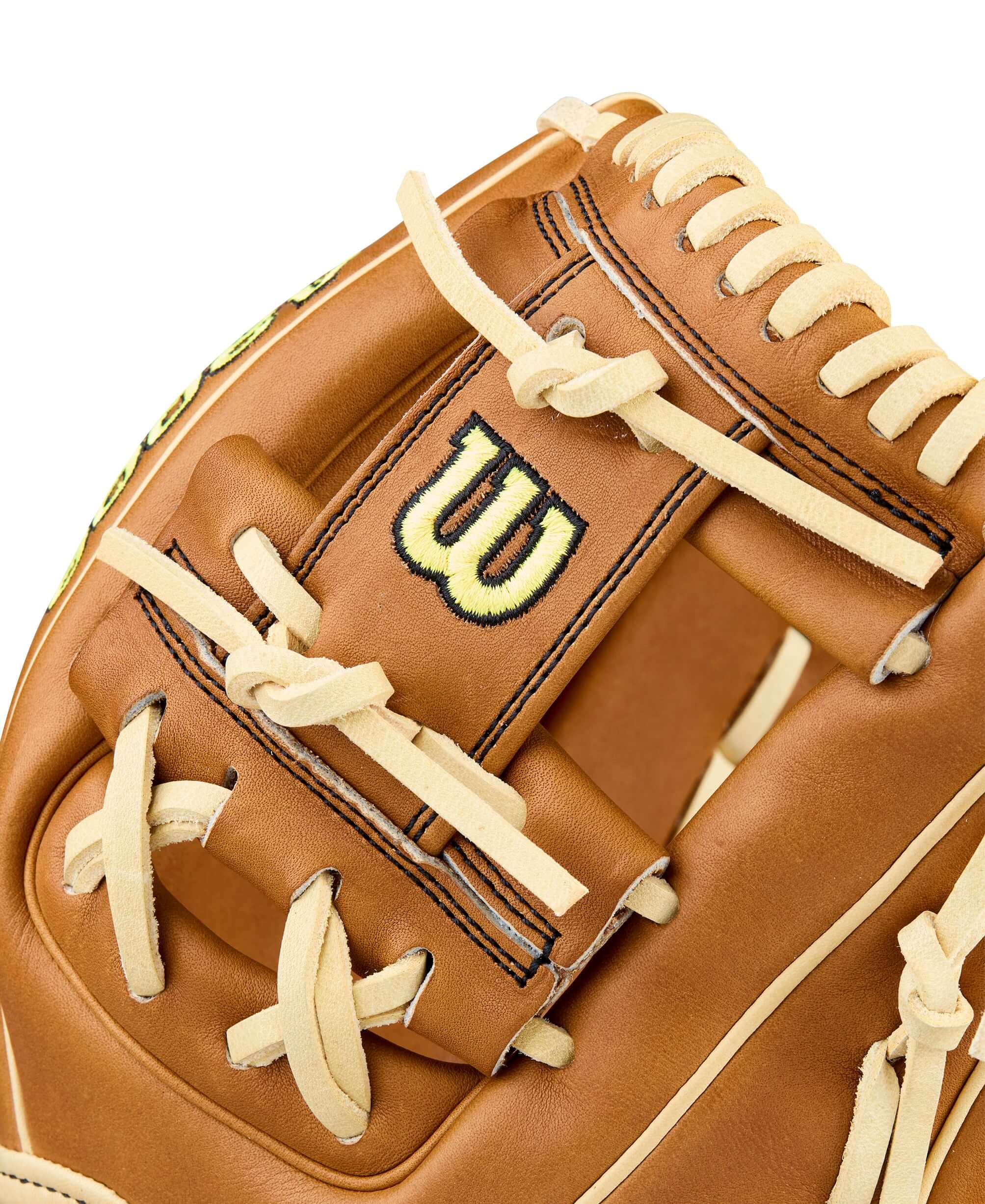Wilson 2026 A2000 Classics Series DP15 11.5” Infield Glove web detail with blonde laces and Wilson logo on saddle tan leather.