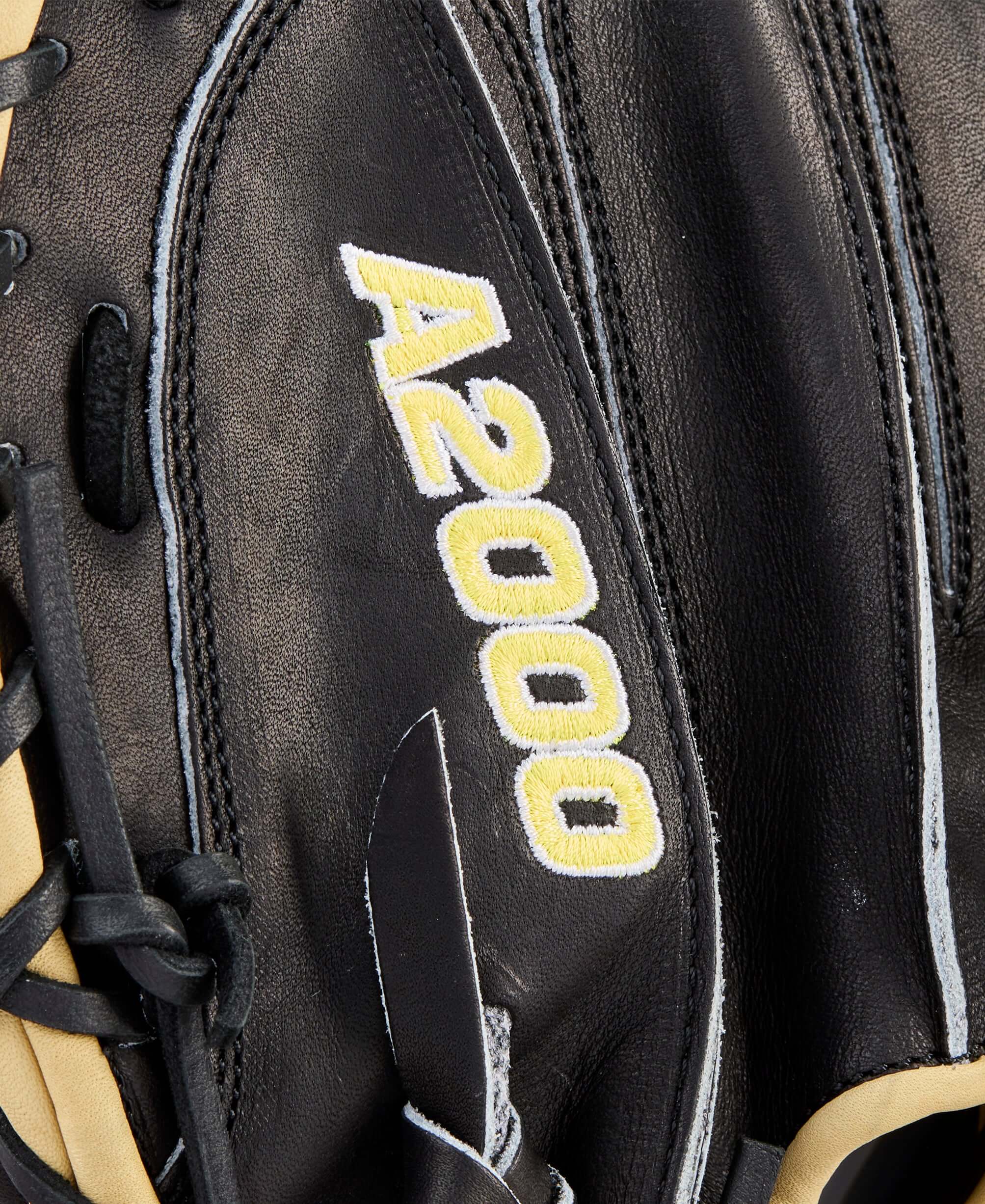 A2000 logo close-up on 2026 A2000 Classics Series 1734 34” Catcher’s Mitt with bold yellow Wilson branding.