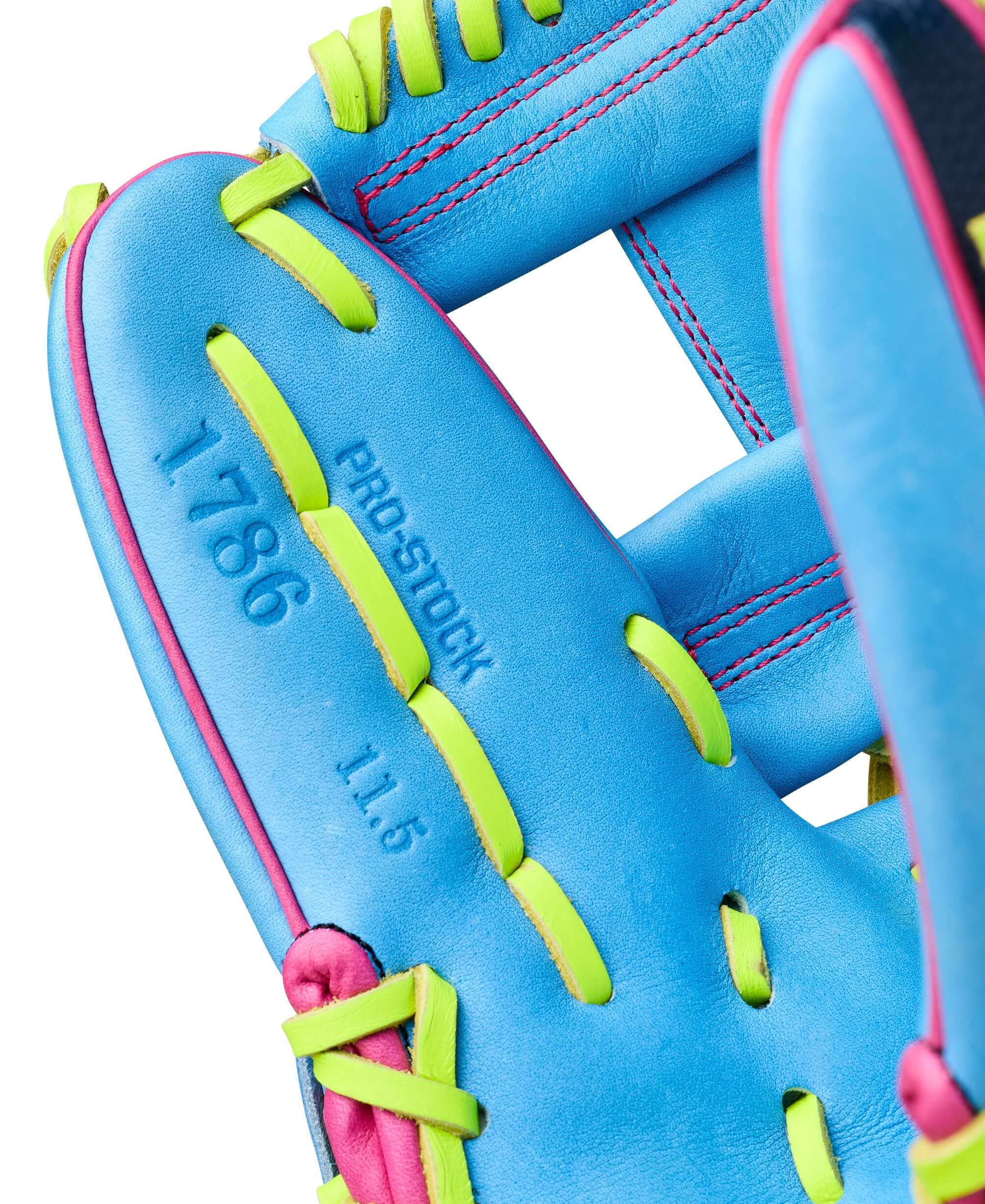 Close-up of palm view with text of Wilson Spring 2026 A2000 1786 11.5” Infield Baseball Glove in blue with green lacing