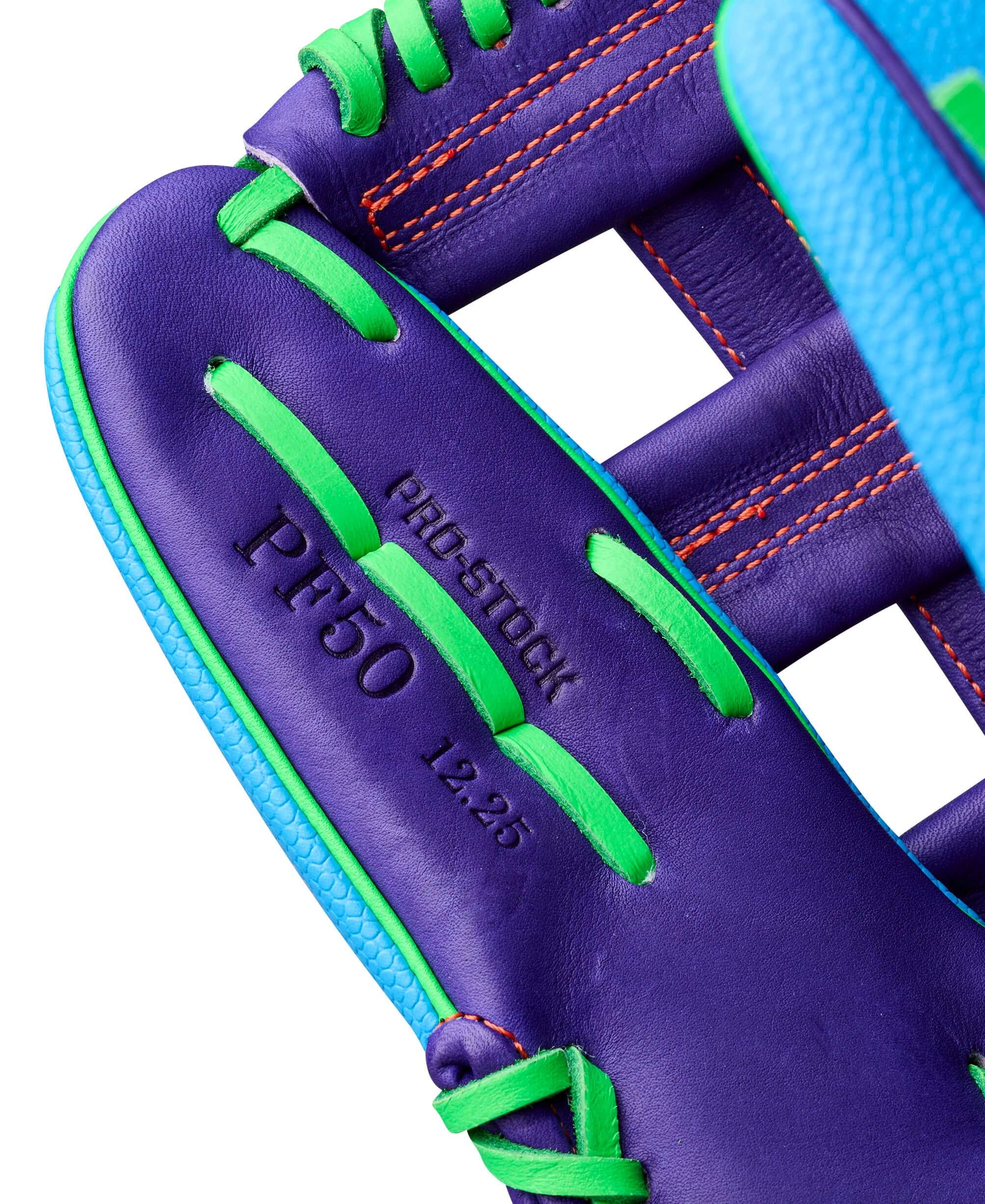 Web detail of WilsonSpring 2026 A2000® PF50SS 12.25” Outfield Baseball Glove showing purple leather with green lacing and orange stitching.