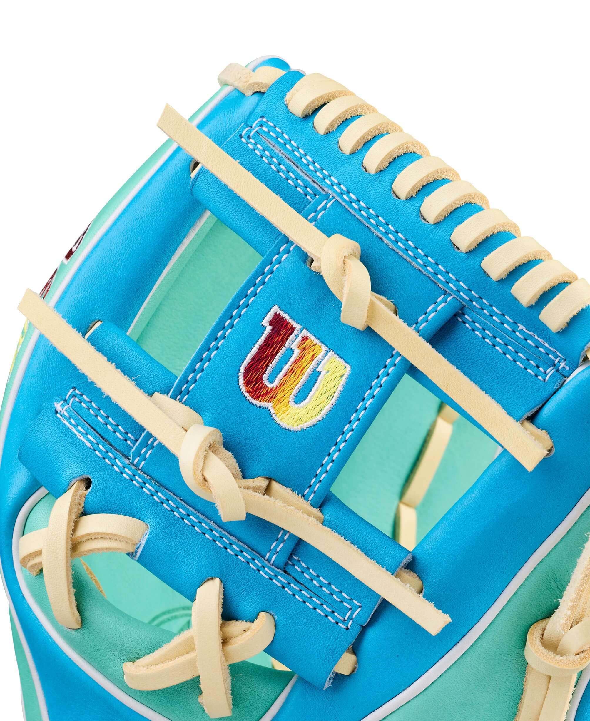 Wilson Spring 2026 A2K 1786 11.5" Infield Baseball Glove H-Web stitch detail in turquoise and beige.