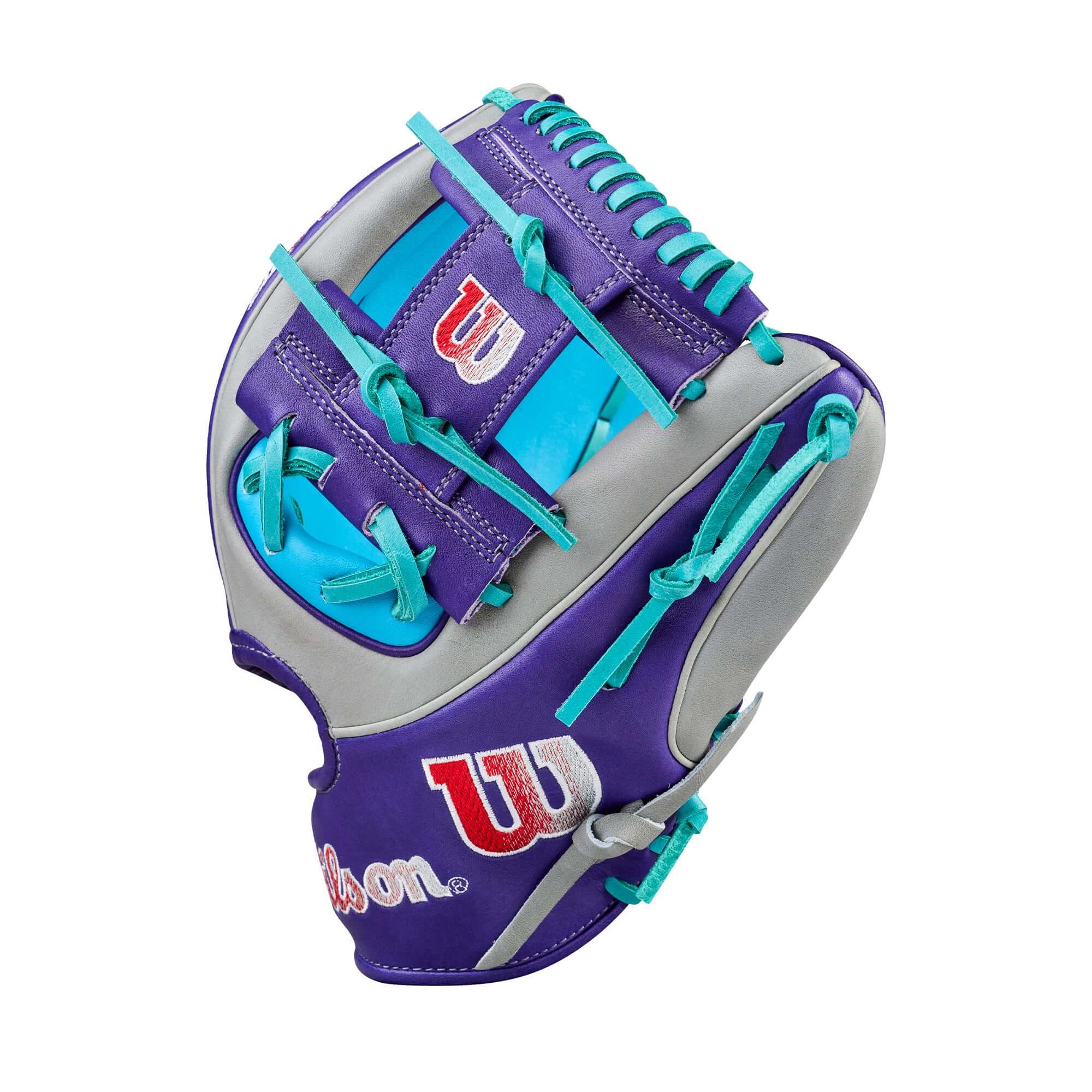 Wilson Spring 2026 A2K MB1975 11.75" Infield Baseball Glove backhand view with purple, teal laces, and logo patch.