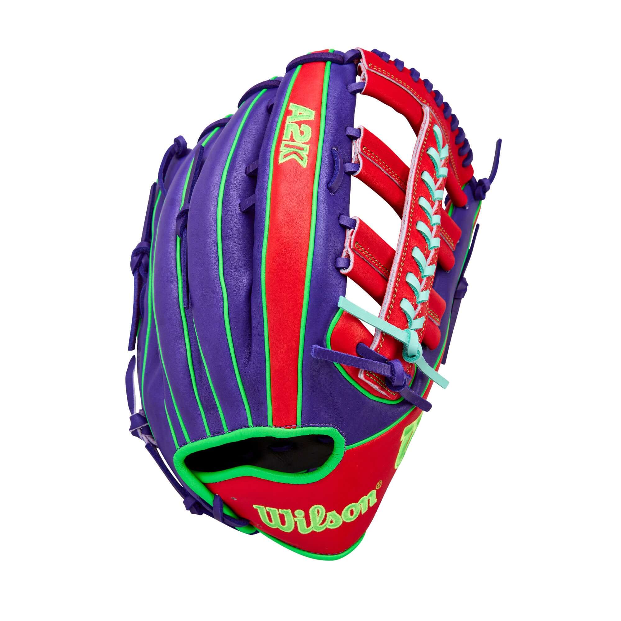 Backhand view of Wilson Spring 2026 A2K 1810 12.75" Outfield Baseball Glove Purple/Red with red lacing and green accents.