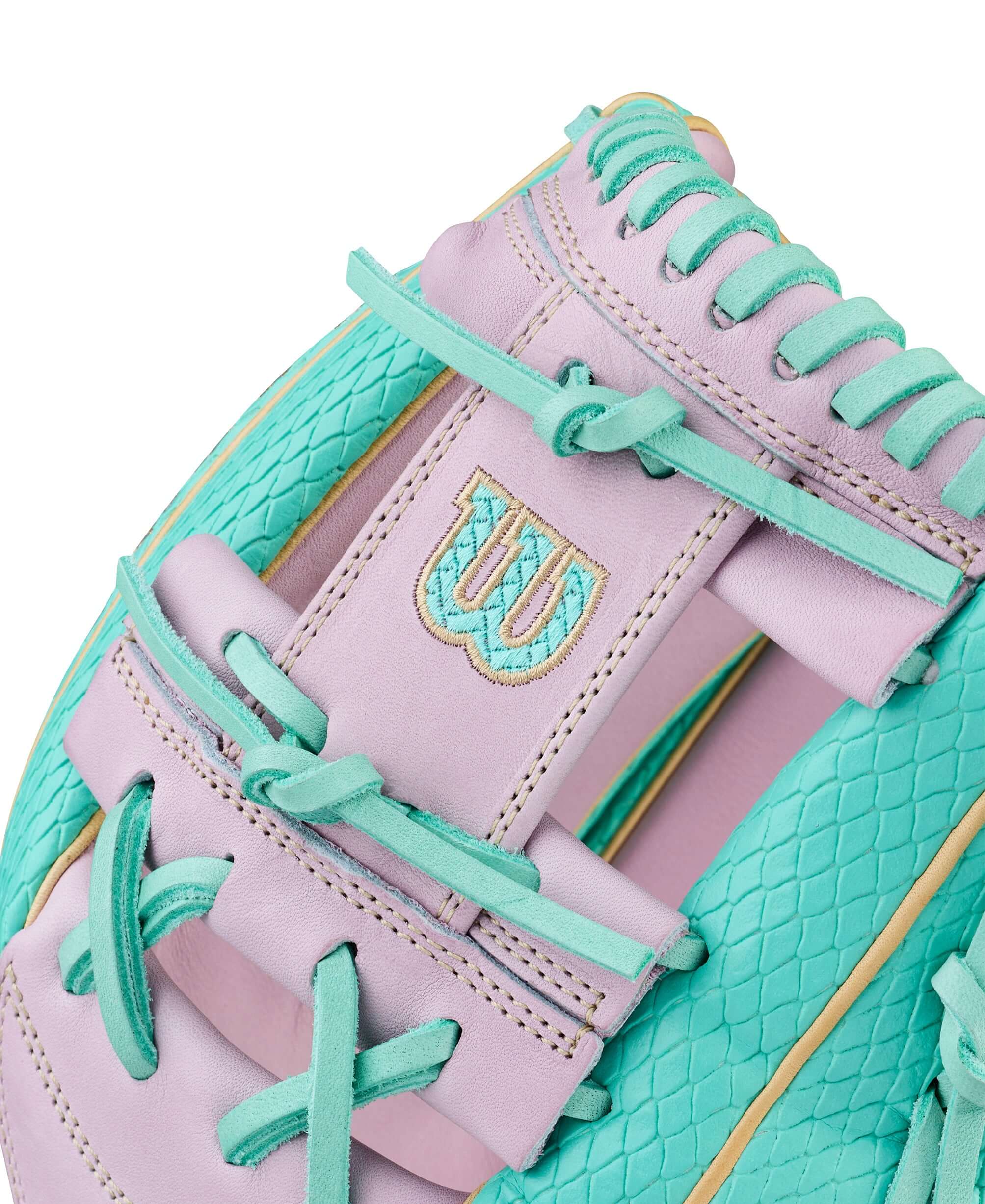 Wilson Spring 2026 A2000 H12SS 12" Infield Fastpitch Softball Glove I-web detail with mint and lavender lacing, close-up view.