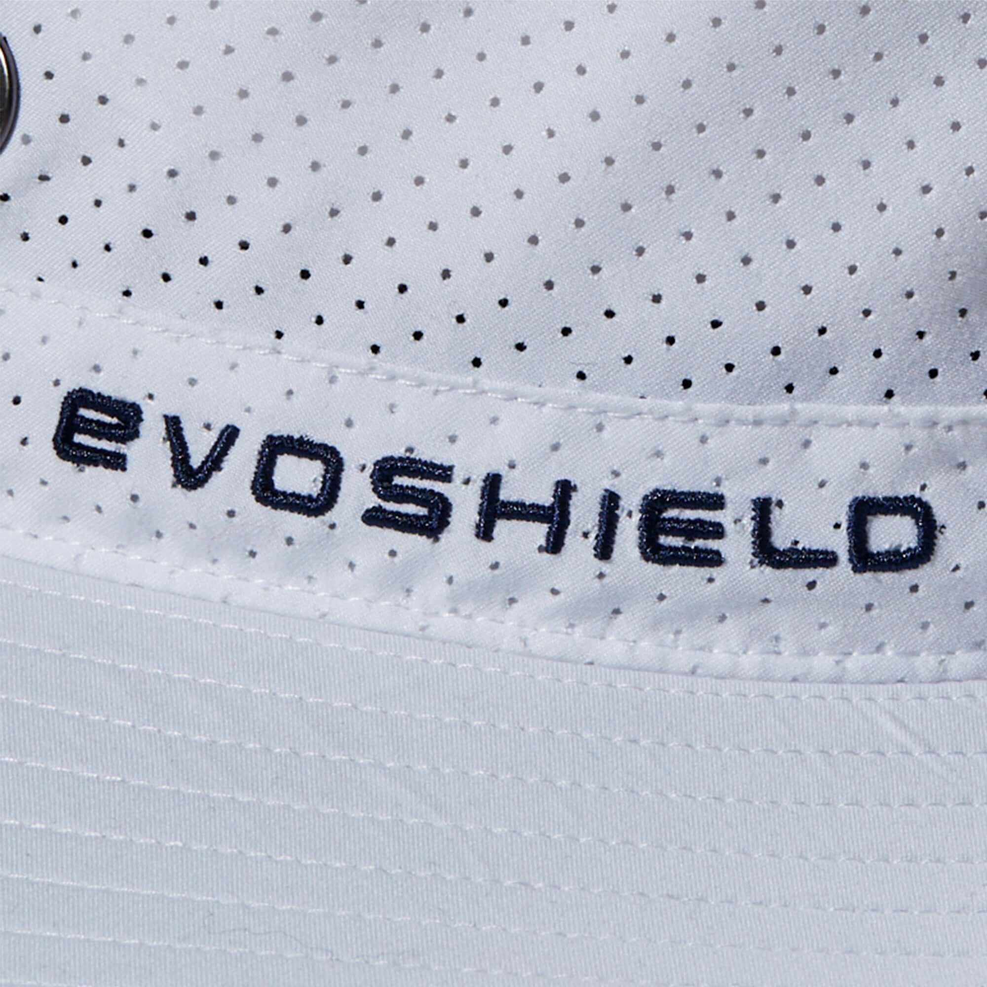 Close-up of EvoShield logo on white bucket hat with breathable fabric for comfort and style.