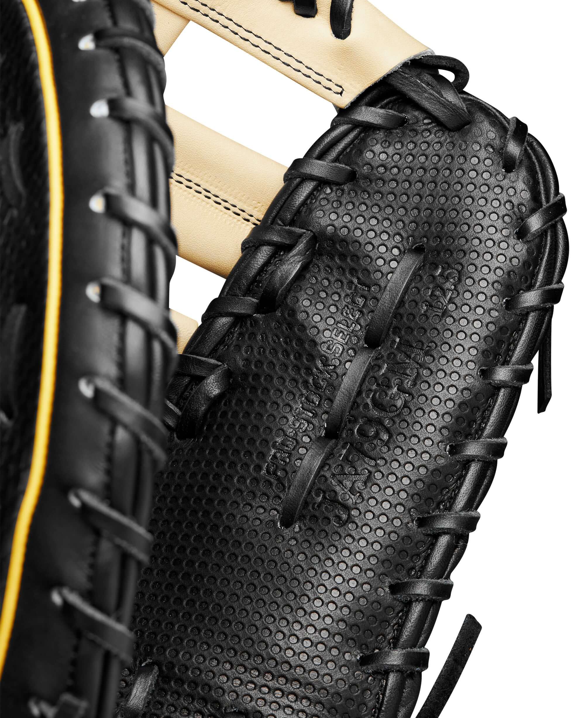 Close-up of Wilson A2K José Abreu first base mitt showcasing Spin Control Technology and premium leather details.