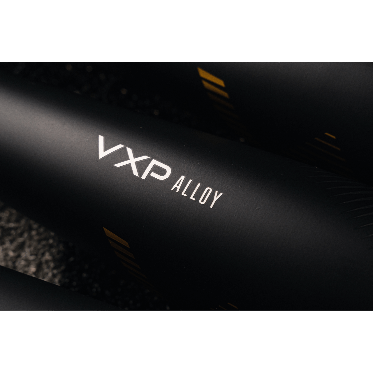 Close-up of VXP Alloy bat with sleek black finish and branding for enhanced performance and control in baseball.