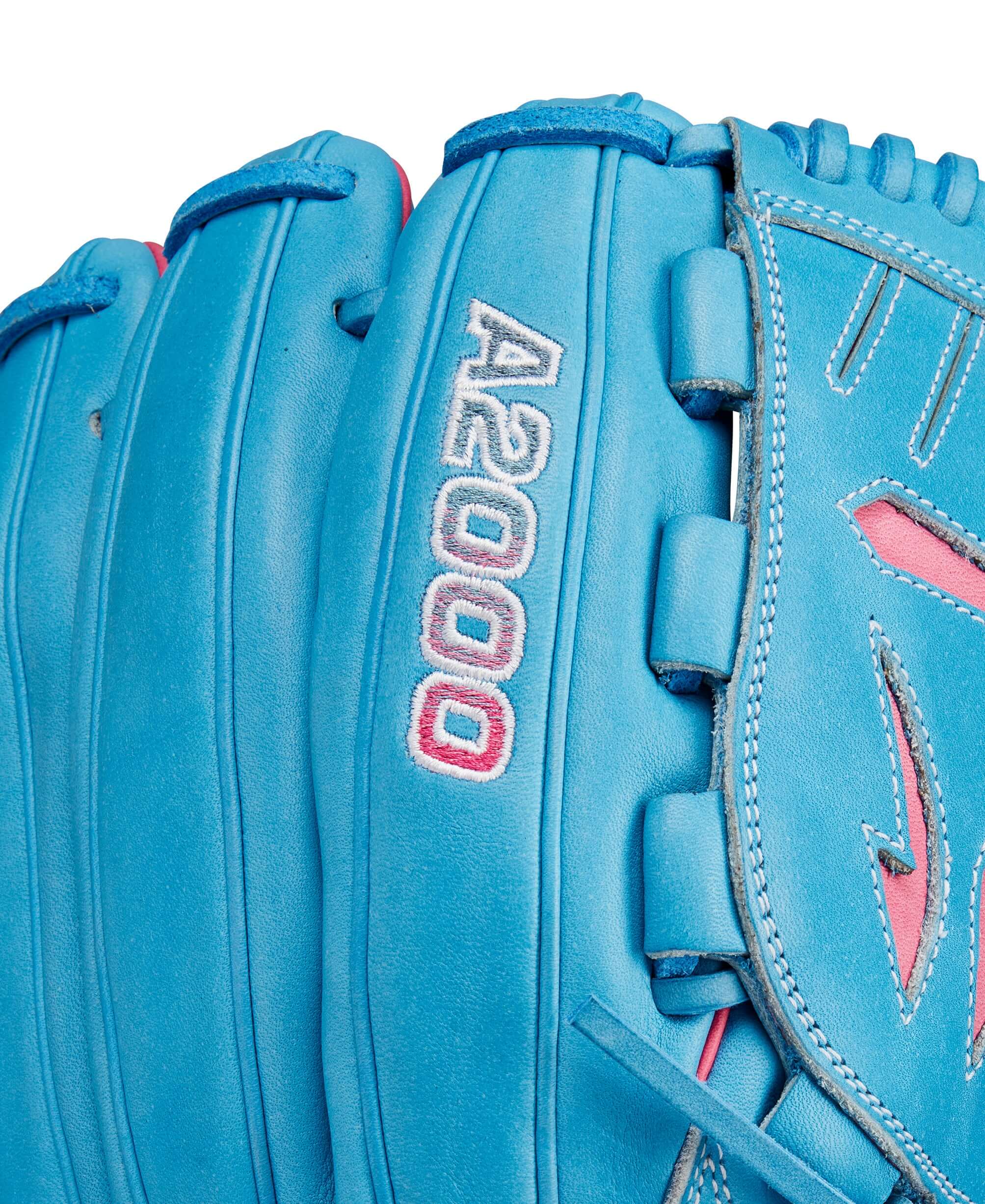Close-up of Wilson A2000 B23 glove in Sky Blue with Flamingo Pink accents and logo detail.