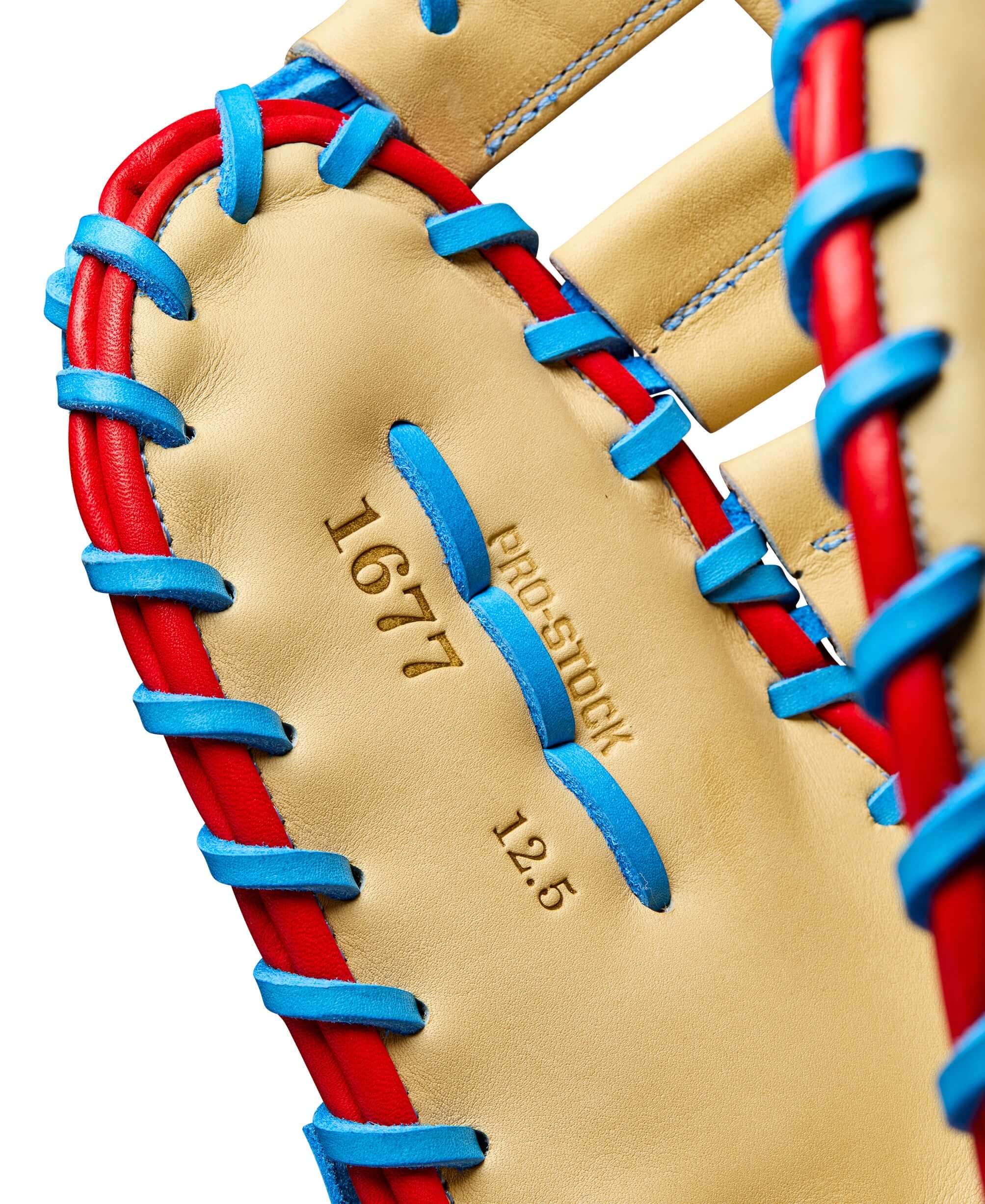 Close-up of Wilson A2000 1677 first base mitt with Blond Pro Stock leather, showing stitching and 12.5" size details.