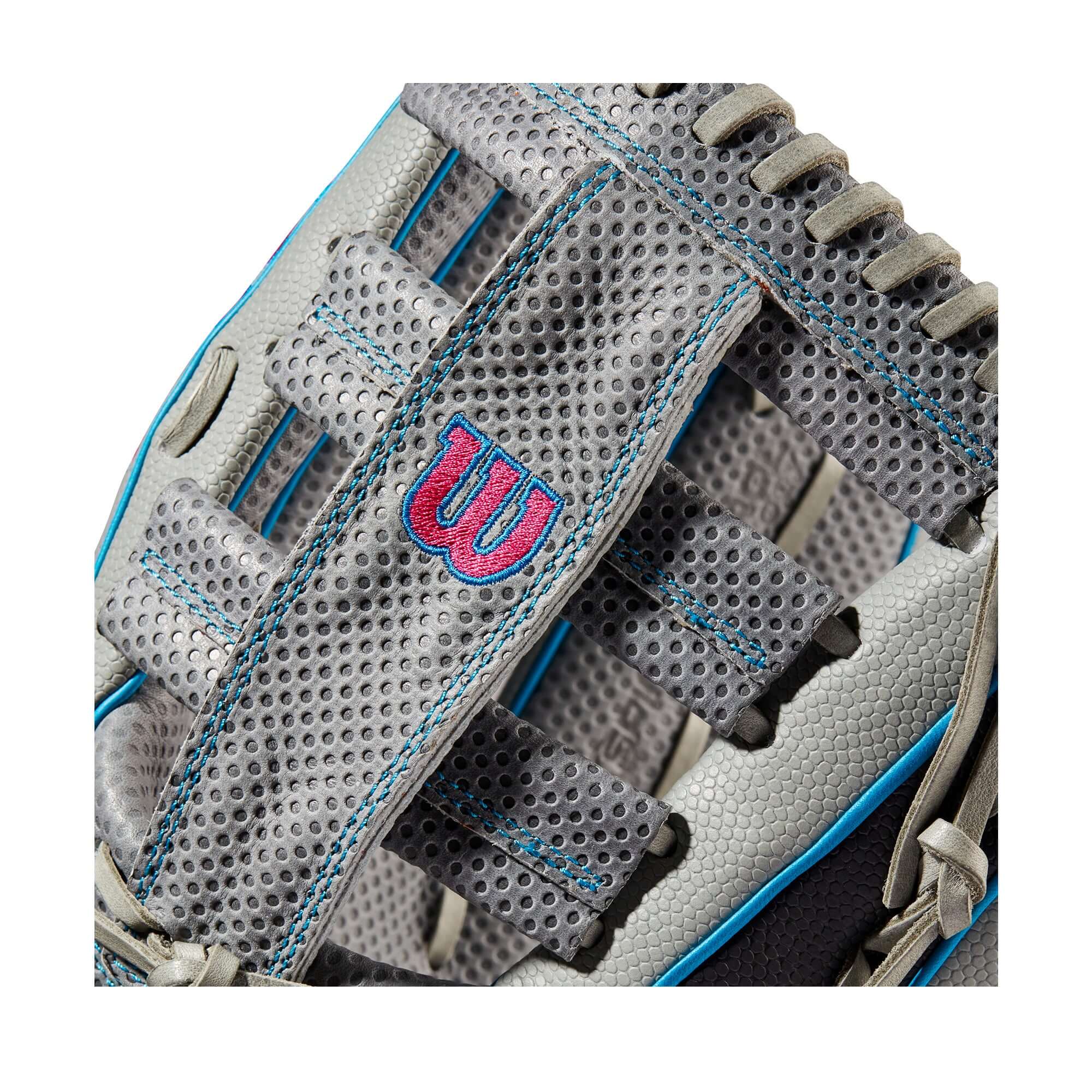 Close-up of the Wilson A2000 SCSP13SS slowpitch glove showcasing grey SuperSkin and vibrant blue accents.