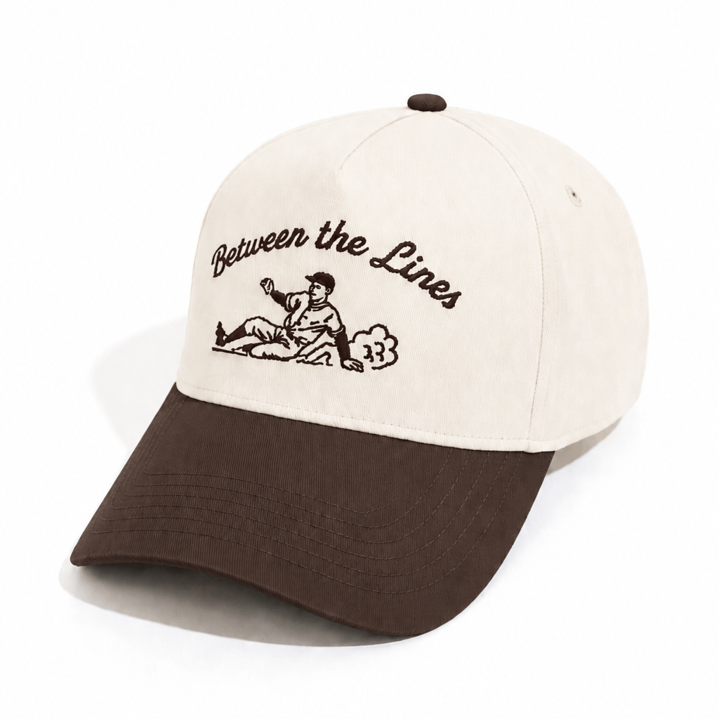 BTL Sliding Man A-Frame Snapback with embroidered baseball player and Between the Lines script on crown