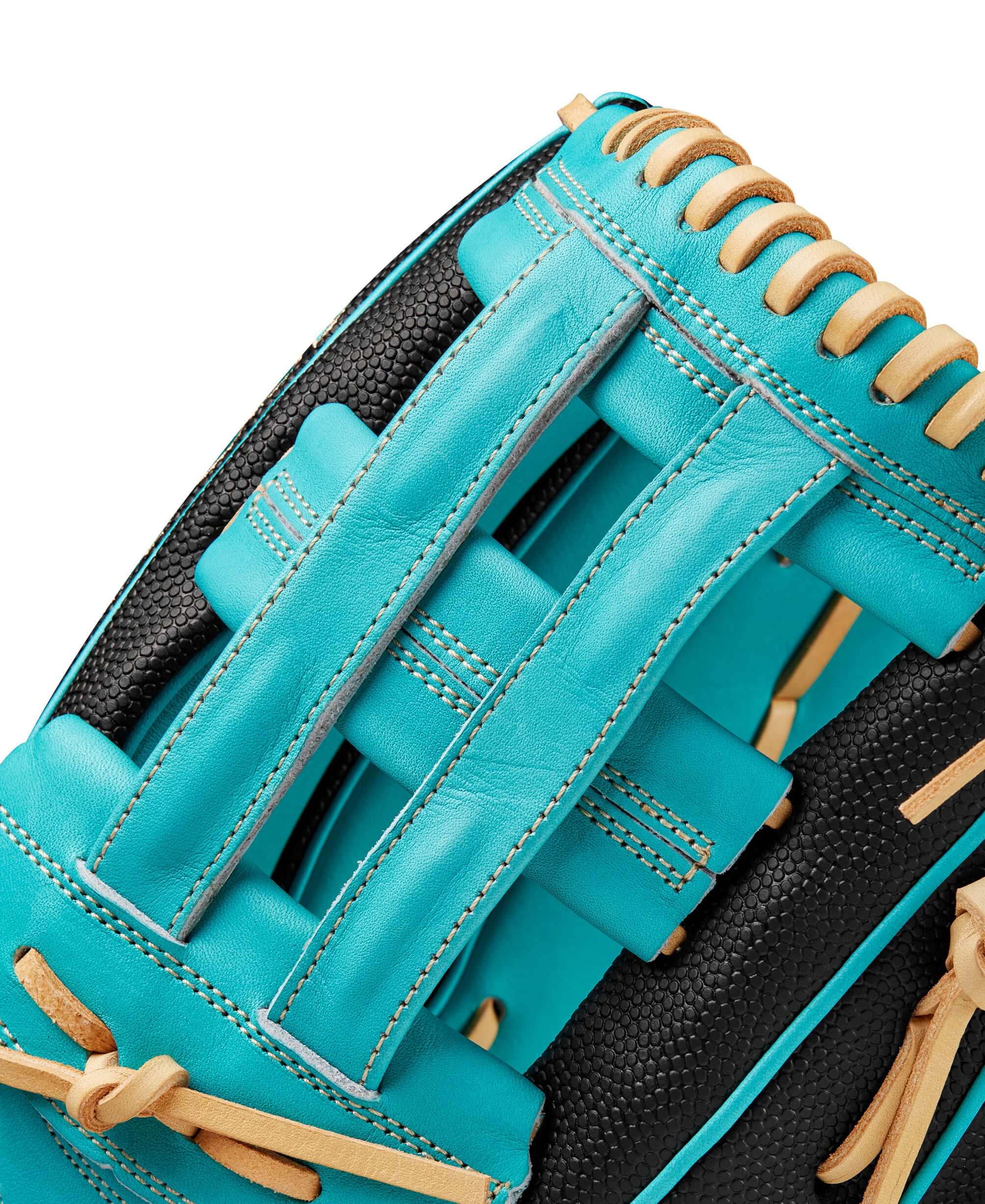 Close-up of the Wilson A2000 PF50SS outfield glove in black and teal, showcasing detailed stitching and leather texture.