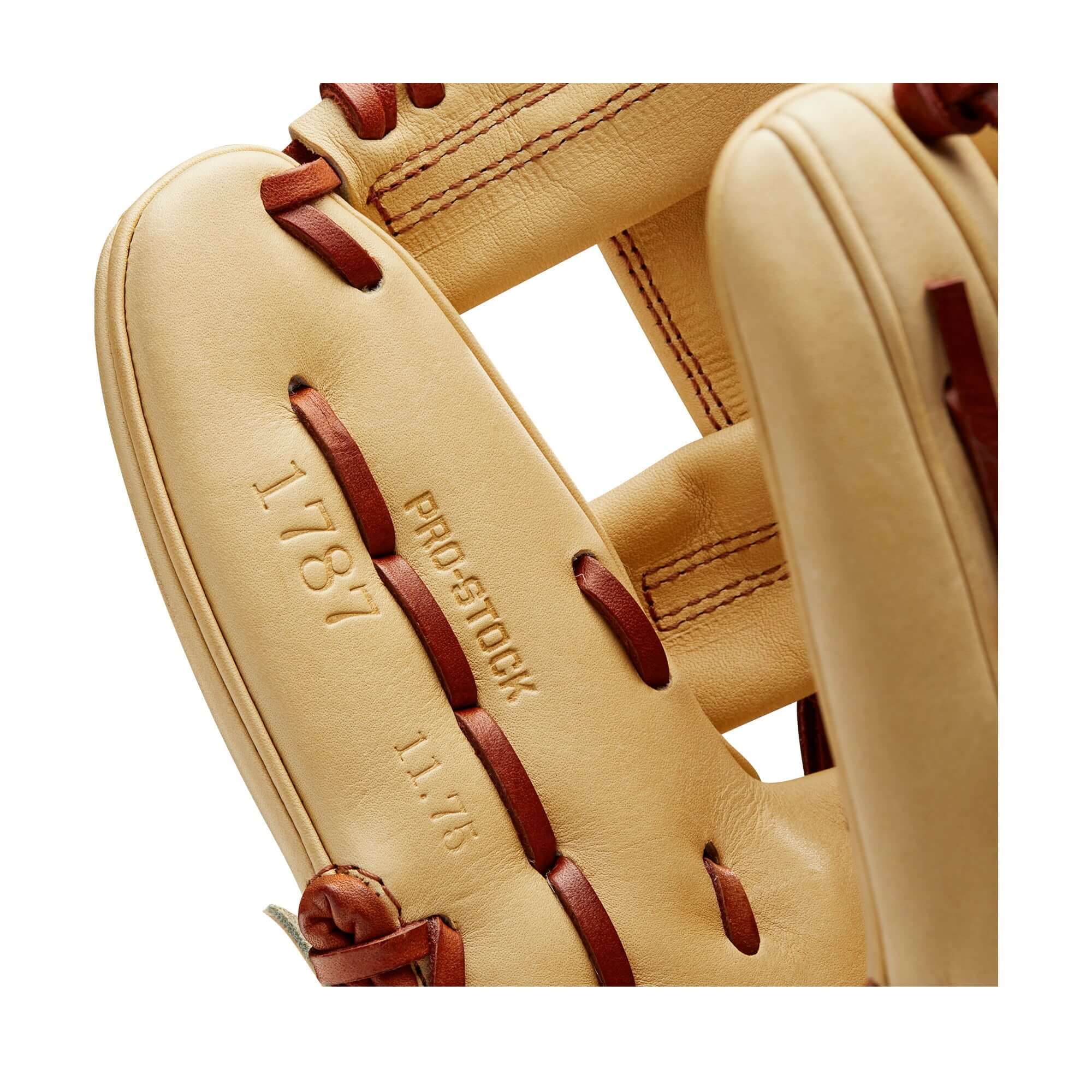 Close-up of Wilson A2000 1787 glove, showcasing Pro Stock leather and embossed markings, featuring a blonde and copper color scheme.