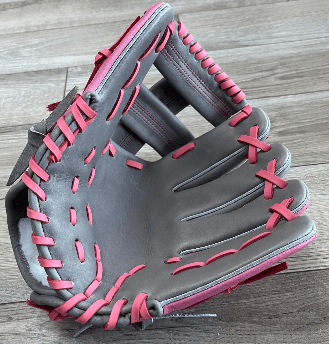Youth 10.75' baseball glove with single post web and pink accents, crafted from Japanese tanned US Steerhide.