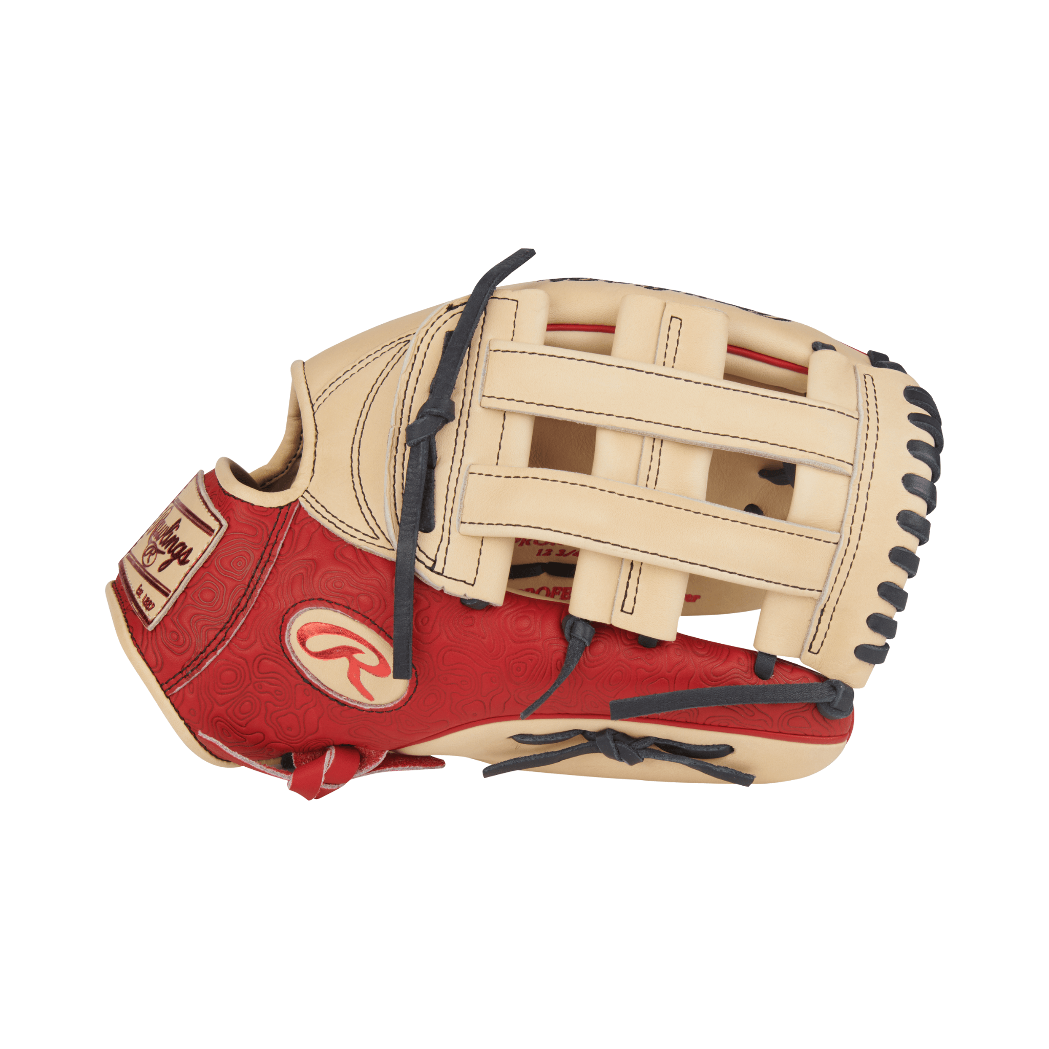 Close-up of thumb area on Rawlings Heart of the Hide 12.75" Camel/Scarlet RHT glove with padded thumb sleeve for comfort