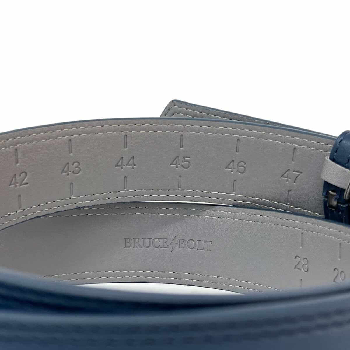 Inside view of Bruce Bolt Adjustable Belt in Navy, showcasing size measurements and high-quality craftsmanship.