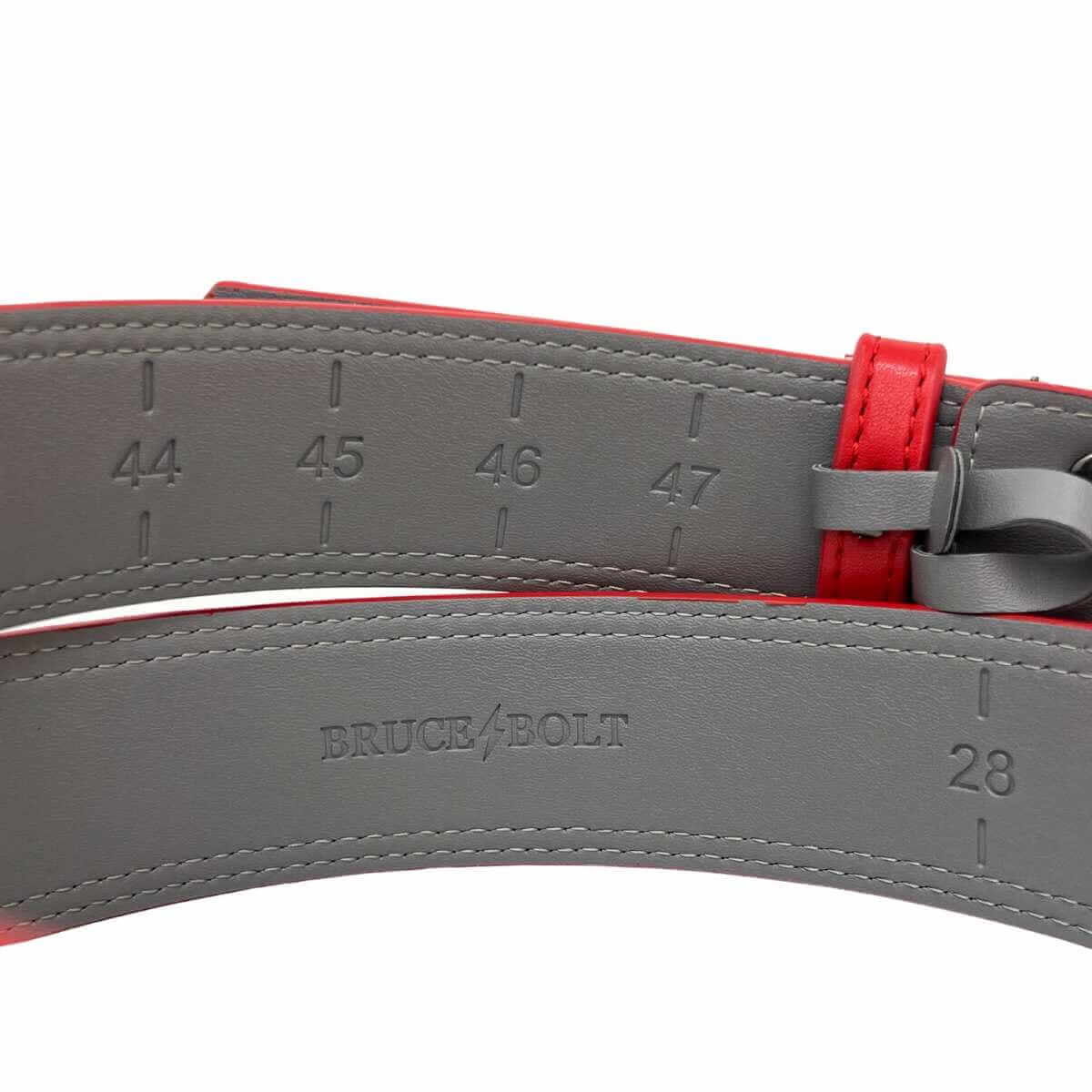 Bruce Bolt Adjustable Belt in Red featuring customizable size markings and coated alloy buckle for a secure fit.