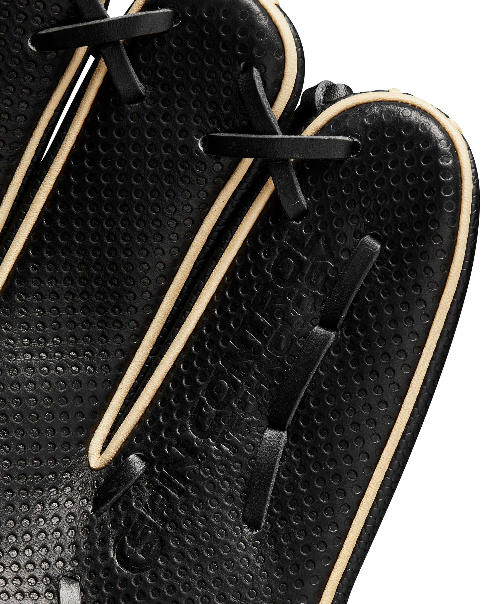 Close-up of Wilson 2024 A2K SC1786SS infield baseball glove showcasing textured SuperSkin™ material and stitching details.