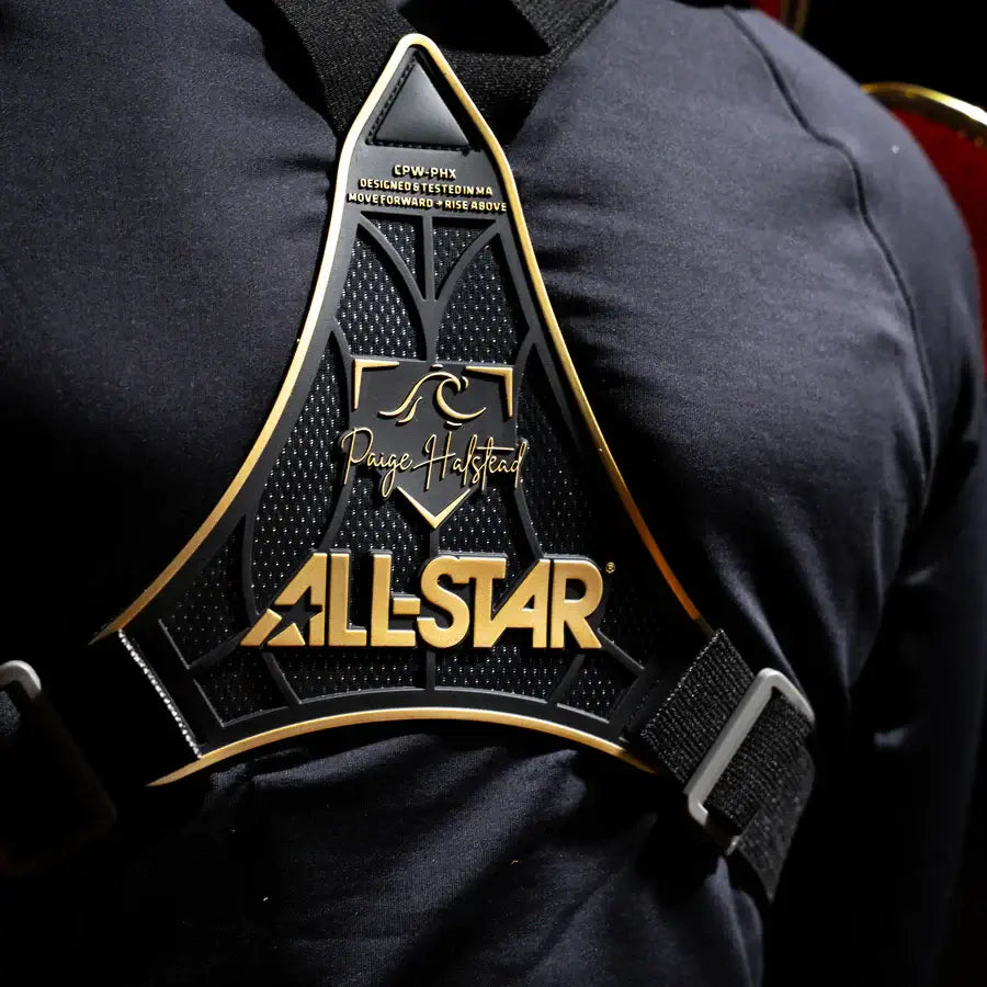 Close-up of All-Star PHX™ Diamond Series chest protector with black and gold accents and visible logos.