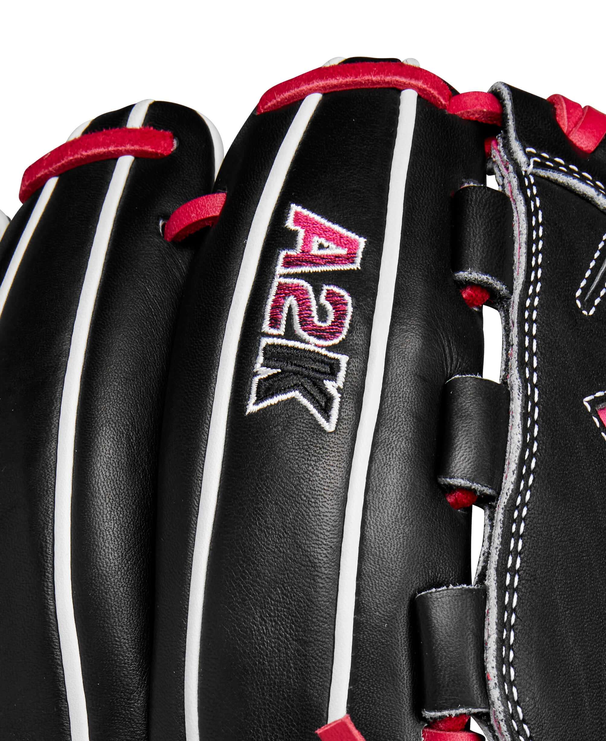 Close-up of Wilson A2K B23 pitcher's glove showcasing black leather and pink accents, highlighting craftsmanship and quality.